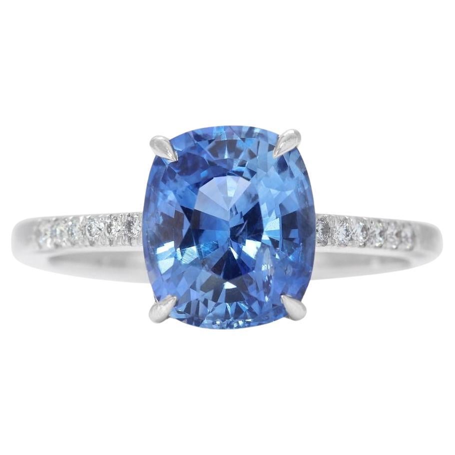 Captivating Blue Stone Ring with 0.10ct Side Diamonds in 18K White Gold ...
