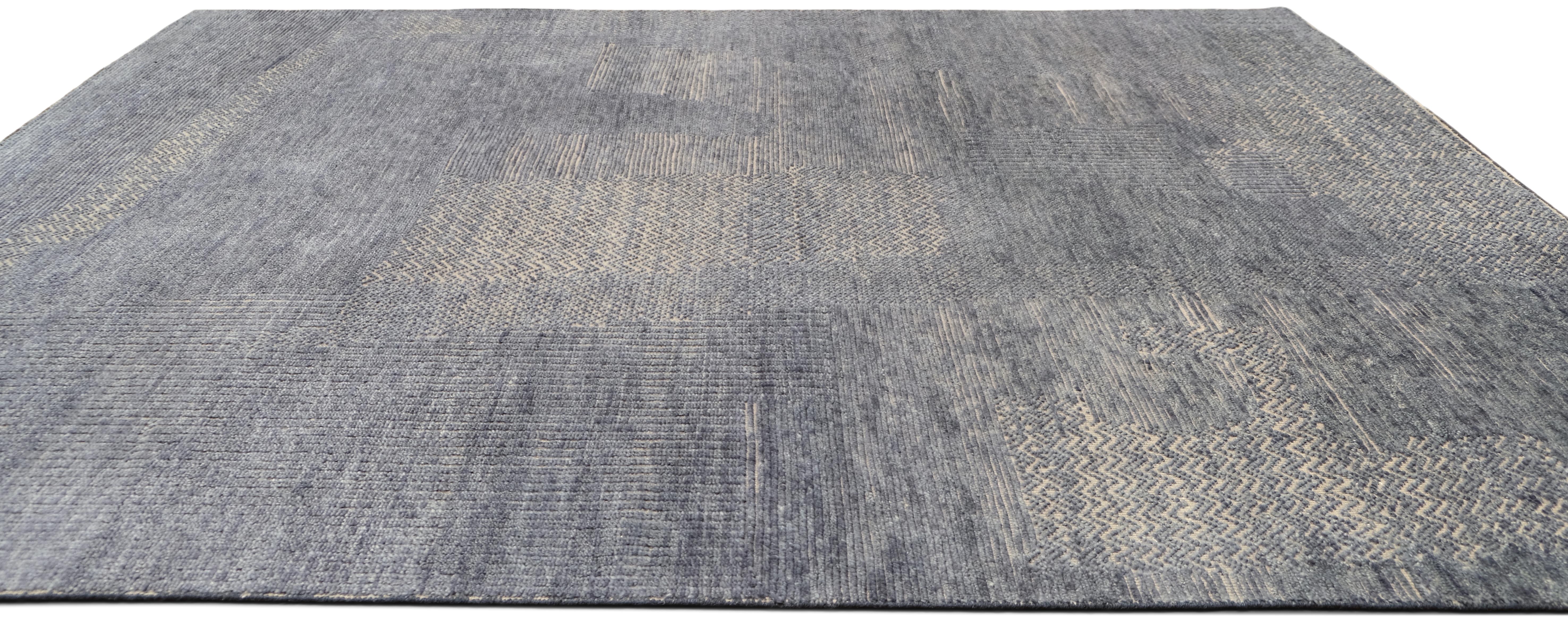 Bezaubernder blauer strukturierter Wollteppich 8'x10' (Asiatisch) im Angebot