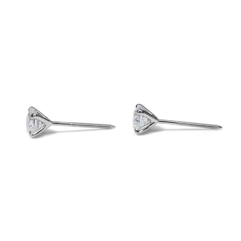 Women's Captivating Brilliance: 2ct D VVS1 Round Brilliant Diamond Earrings For Sale