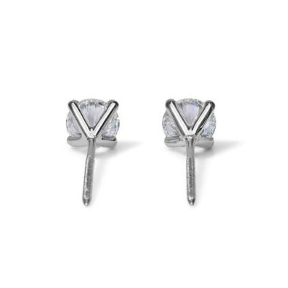 Captivating Brilliance: 2ct D VVS1 Round Brilliant Diamond Earrings For Sale 1