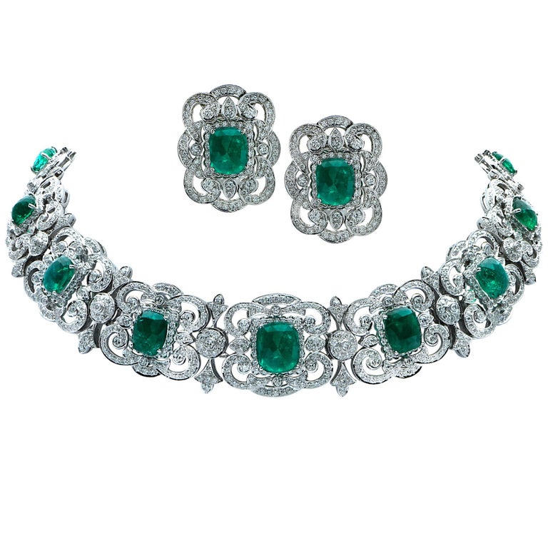 Captivating Emerald and Diamond Earrings and Necklace 18 Karat White