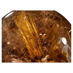 Captivating Quartz Sphere with Golden Rutile Inclusions