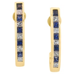 Boucles d'oreilles captivantes en or jaune 18 carats avec saphirs et diamants certifiés IGI