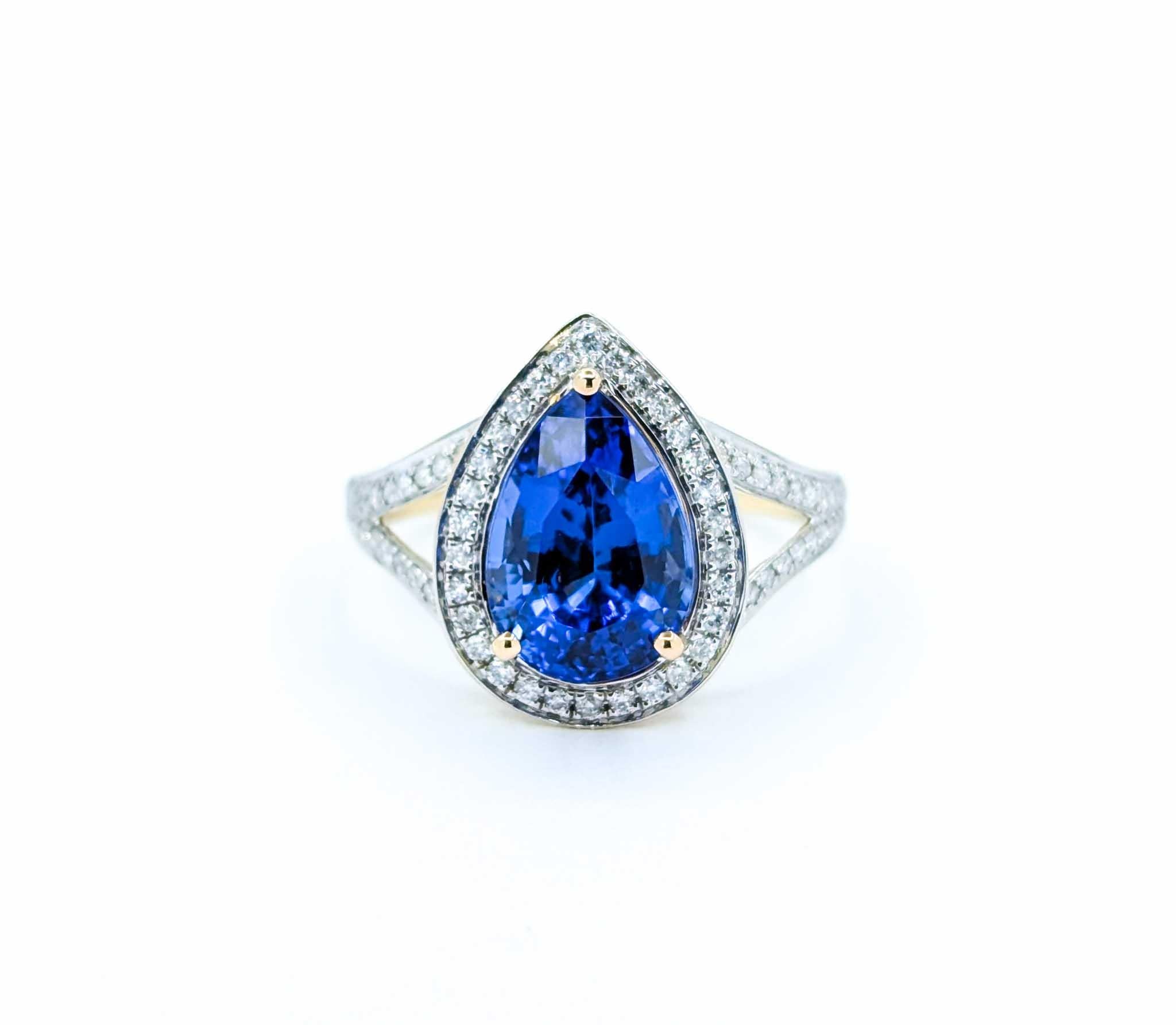 Captivating Tanzanite & Diamond Halo Ring in 14k Yellow Gold For Sale 7