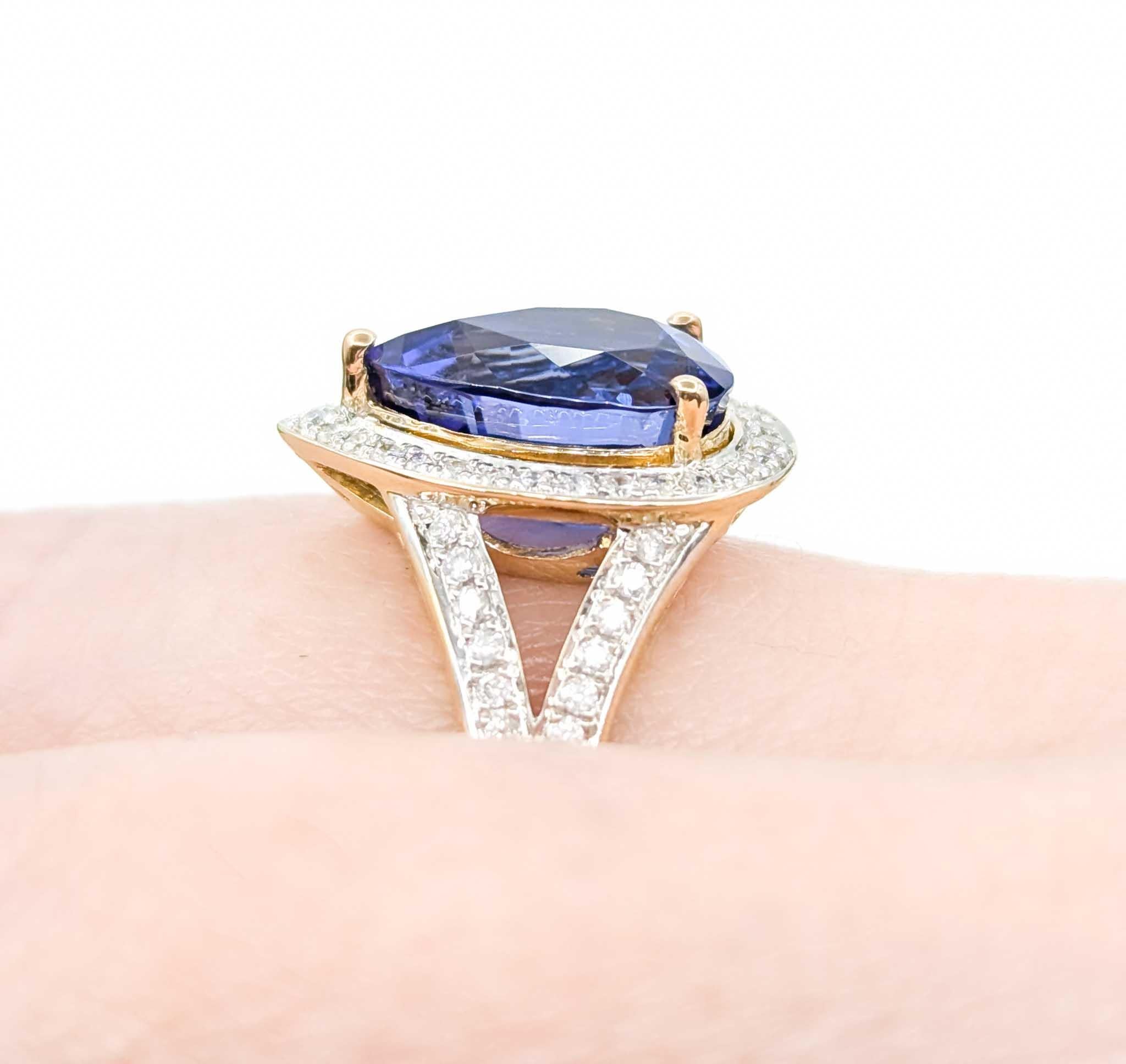 Contemporary Captivating Tanzanite & Diamond Halo Ring in 14k Yellow Gold For Sale