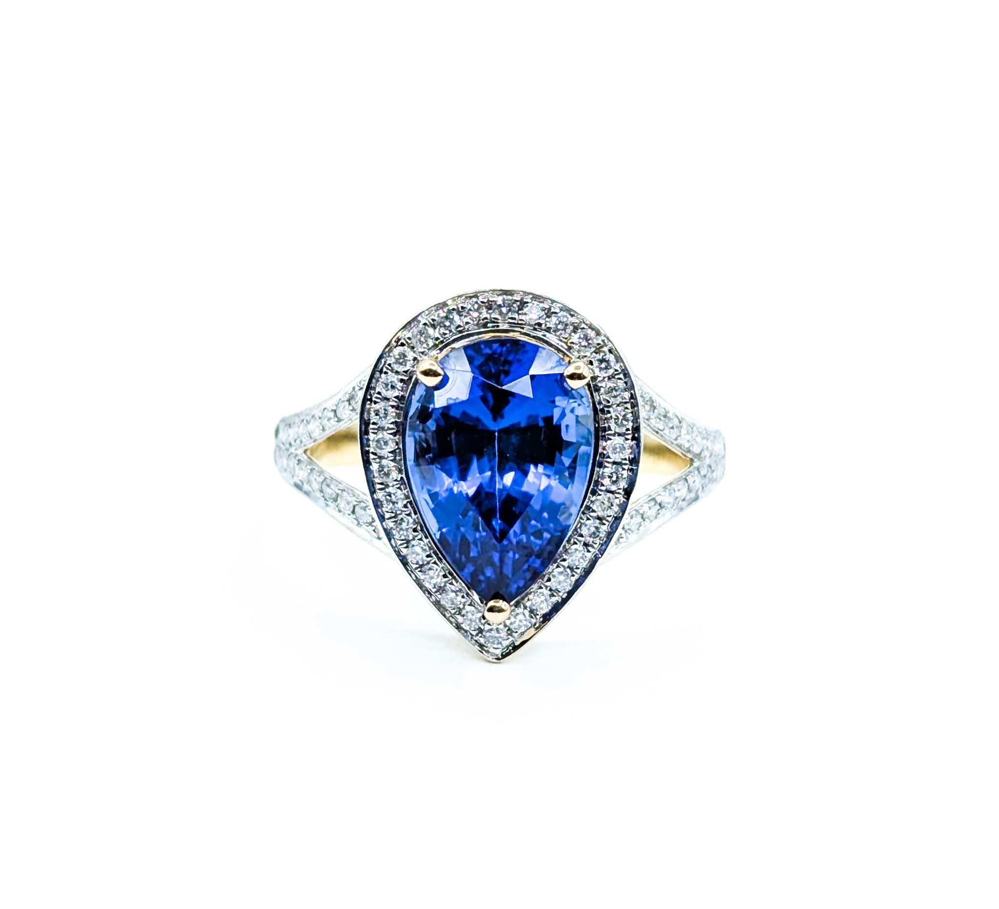 Women's Captivating Tanzanite & Diamond Halo Ring in 14k Yellow Gold For Sale