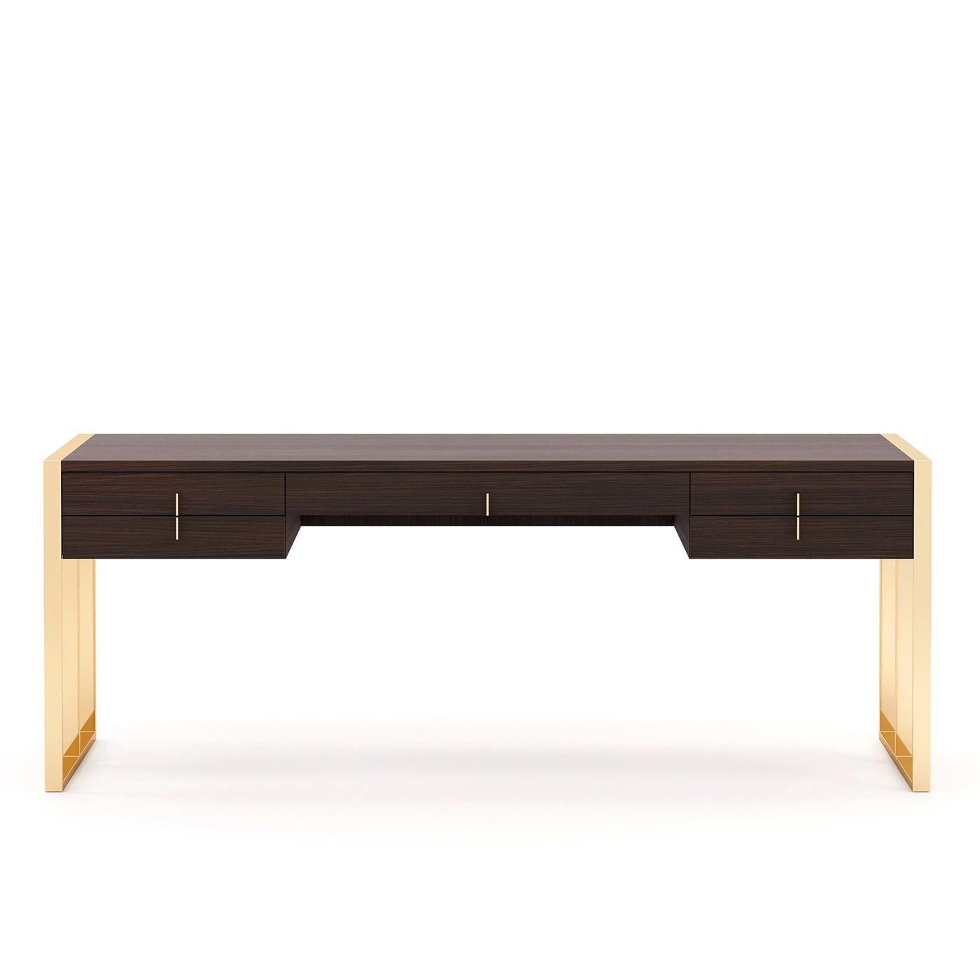 Desk Capton with structure in smocked eucalyptus veneered
wood in matte finish, with 5 drawers with easy glide system. 
With base in polished stainless steel in gold finish.
Also available in ebony matte finish, or grey oak matte finish,
or
