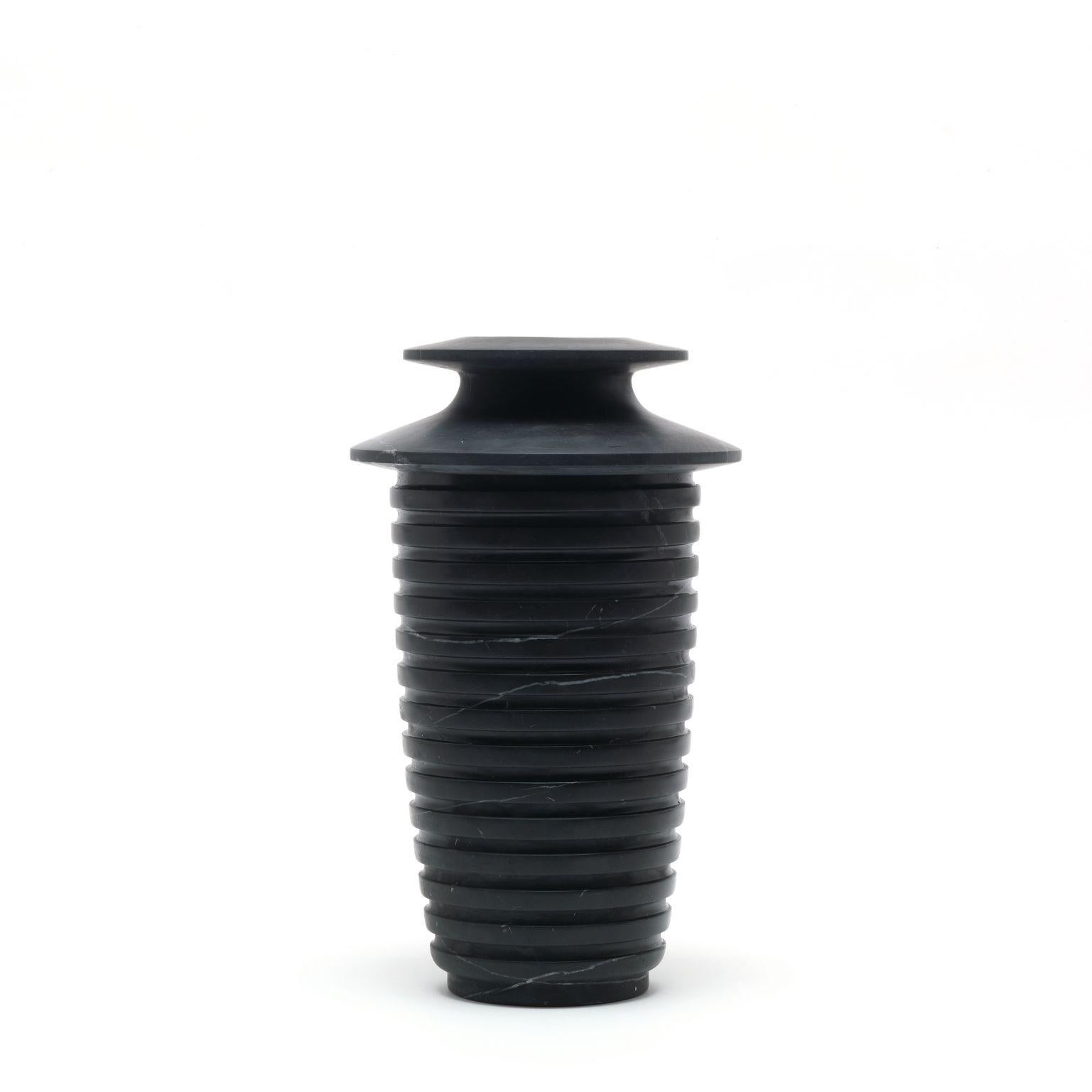 Capua large vase by Ivan Colominas
Capua Collection
Dimensions: 19 x 32 cm
Materials: Nero Marquinia

Also available: Medium,

A vase that’s an homage to design and to marble itself: the Marquinia veins look skyward, toward the crater defined