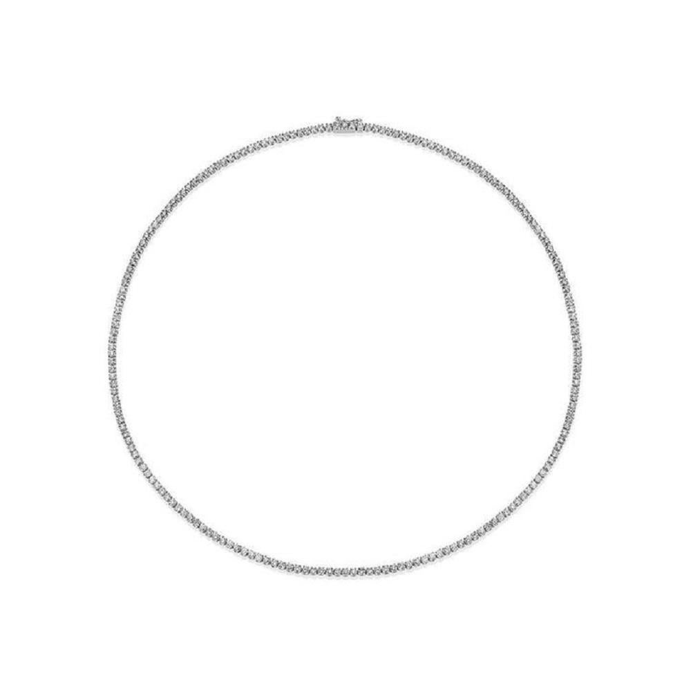 Handmade in New York of polished 14k white gold, CAPUCELLI's Tennis necklace showcases a delicate box chain embellished with dozens of shimmering white diamonds.

Beautiful Diamond Tennis Necklace. A staple in your jewelry collection. Handmade in