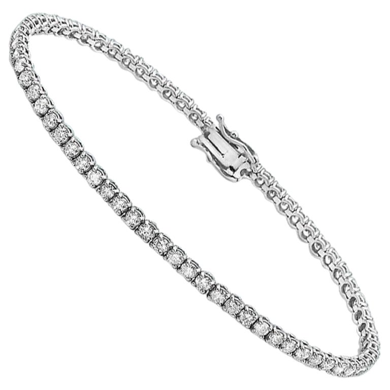 Capucelli 6,00 ct. Bracelet tennis « T.W. » à 4 griffes en or 14 carats et diamants naturels