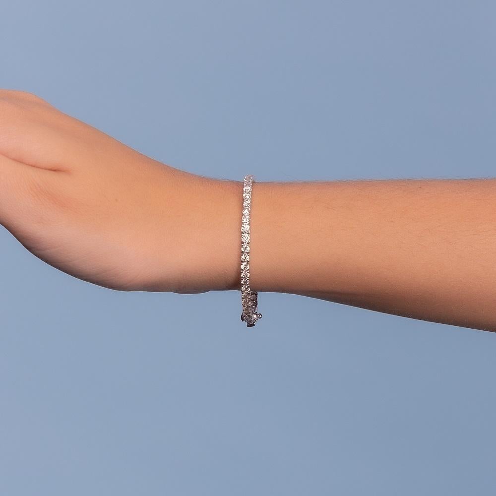 Taille ronde Bracelet tennis de Capucelli à 4 griffes en or 14 carats avec diamants naturels de 6,50 carats en vente