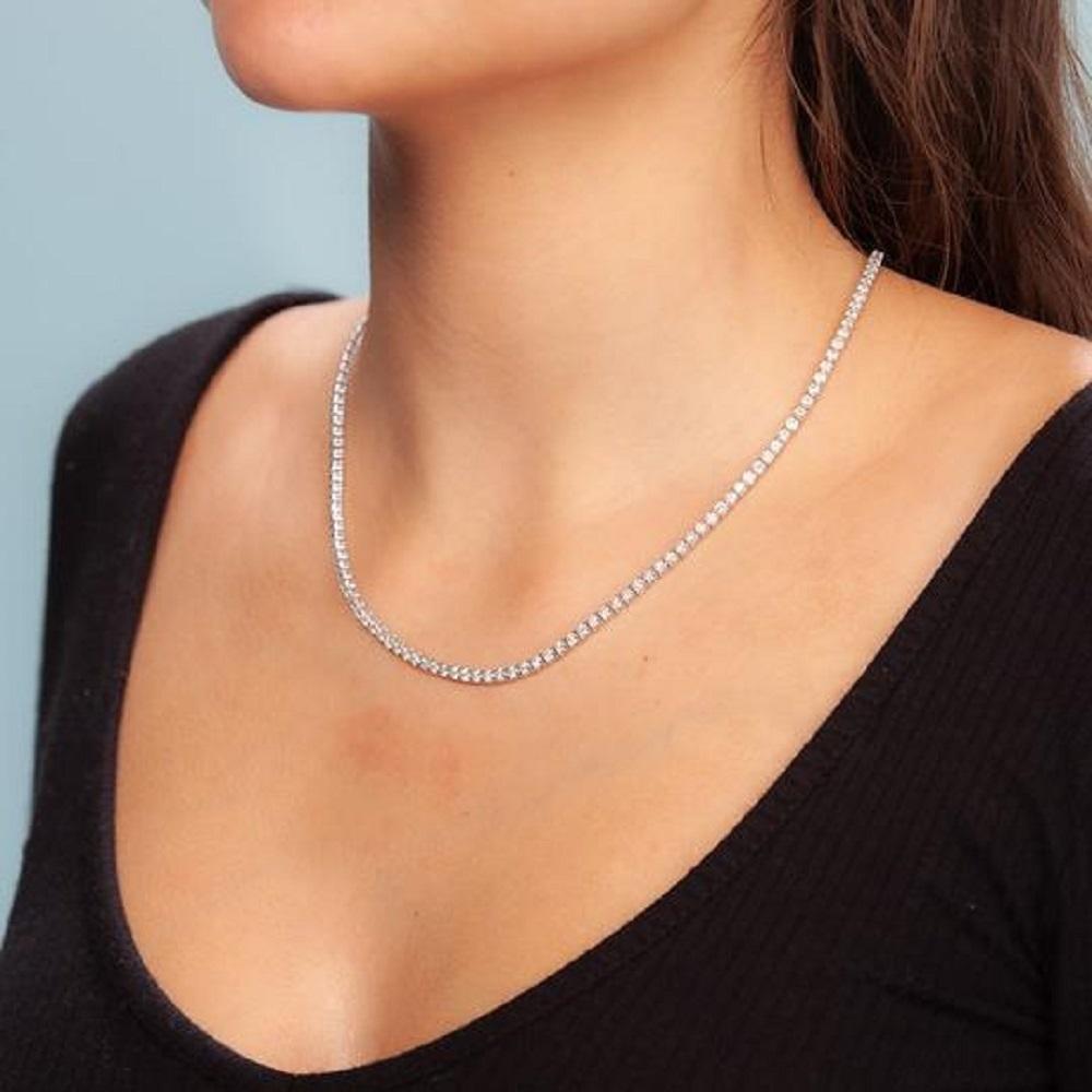 Handmade in New York of polished 14k white gold, CAPUCELLI's Tennis necklace showcases a delicate box chain embellished with dozens of shimmering white diamonds.

Beautiful Diamond Tennis Necklace. A staple in your jewelry collection. Handmade in