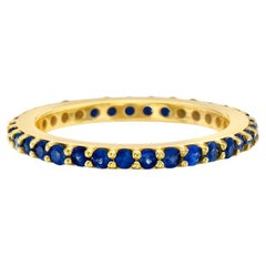 Capucelli, bague d'éternité à 4 griffes en or 14 carats avec saphir bleu (1,25 carat)