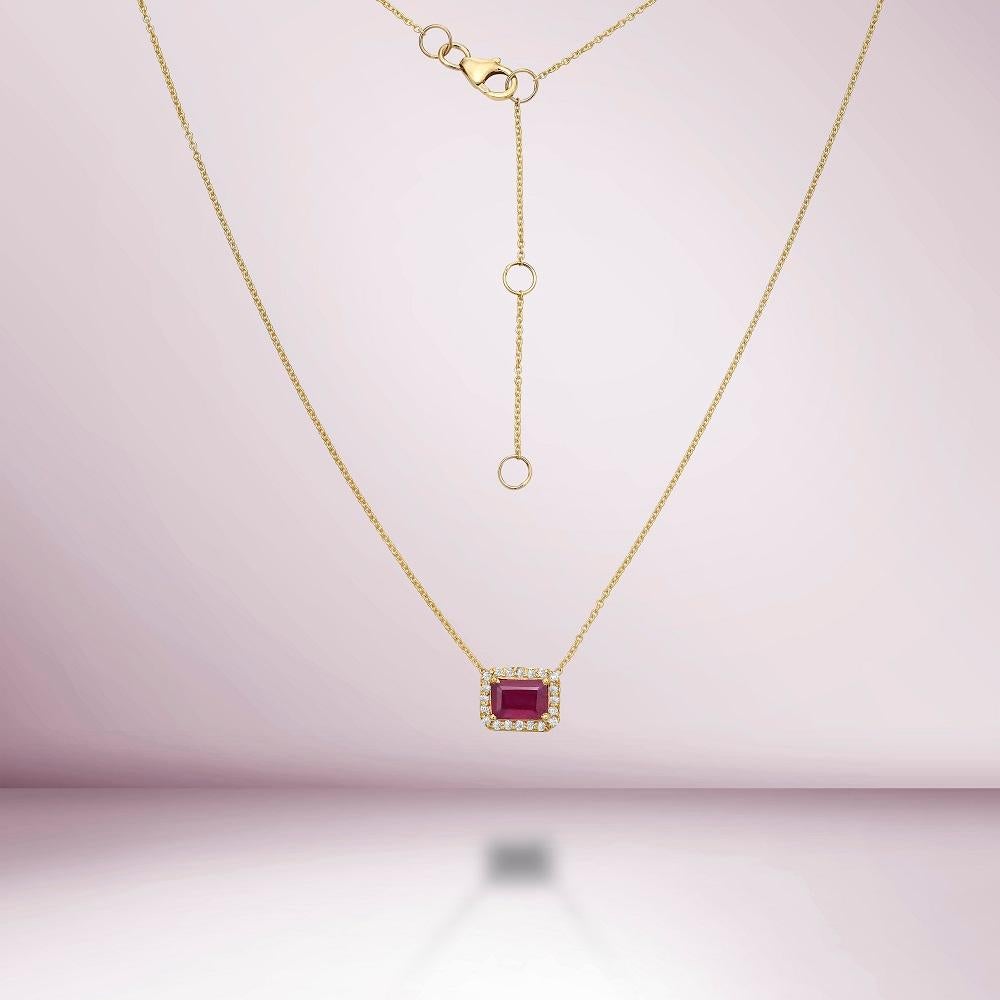 The Emerald Cut Ruby & Diamond Halo Necklace (1.41 ct.) in 14K Gold is a stunning piece of jewelry that features a beautiful emerald cut ruby surrounded by a halo of sparkling diamonds. 
This necklace is made of 14K gold, which is a durable and