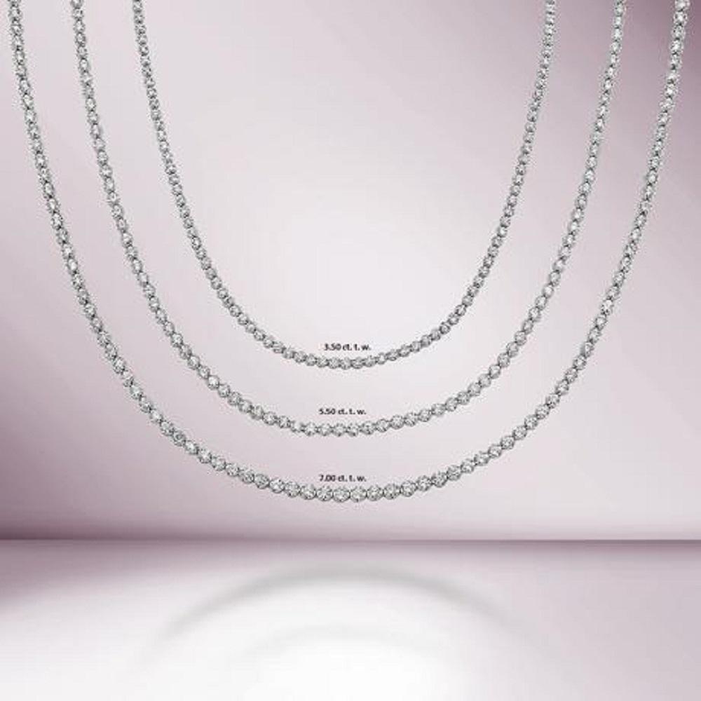 
Handmade in New York of polished 14k white gold, CAPUCELLI's Tennis necklace showcases a delicate box chain embellished with dozens of shimmering white diamonds.

Beautiful Diamond Tennis Necklace. A staple in your jewelry collection. Handmade in