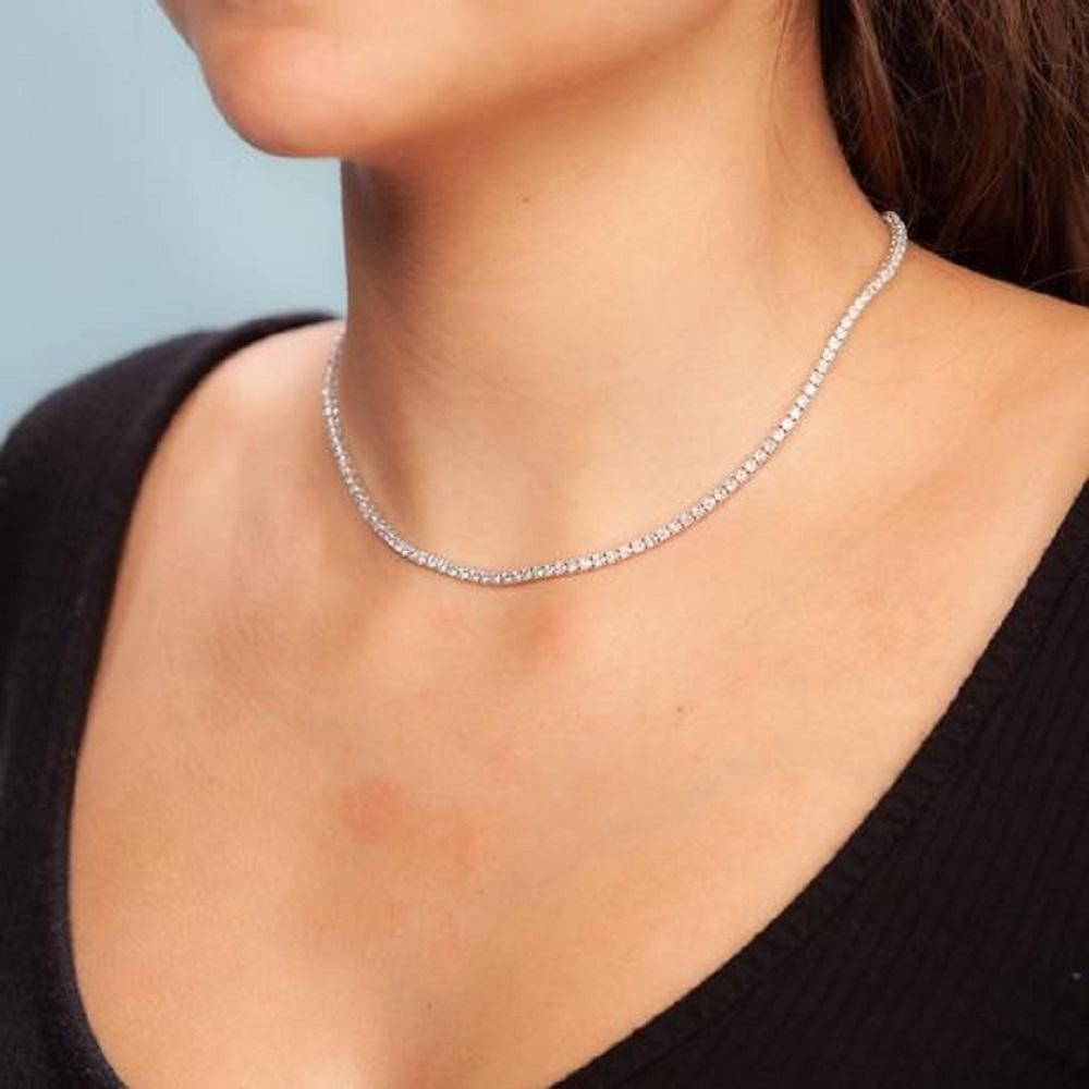 Handmade in New York of polished 14k white gold, CAPUCELLI's Tennis necklace showcases a delicate box chain embellished with dozens of shimmering white diamonds.

Beautiful Diamond Tennis Necklace. A staple in your jewelry collection. Handmade in