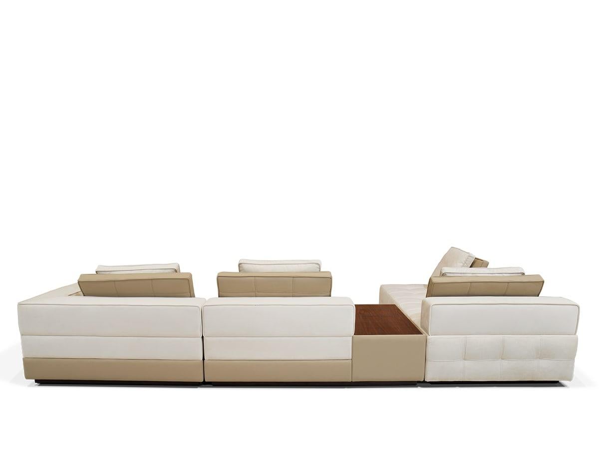 Contemporary Modern Capuchin Velvet Sofa by Caffe Latte is an incredible sofa, upholstered in a cappuccino high-quality velvet and leather. With an exquisite built-in walnut side table, this piece is a modular sofa so you can change the position of