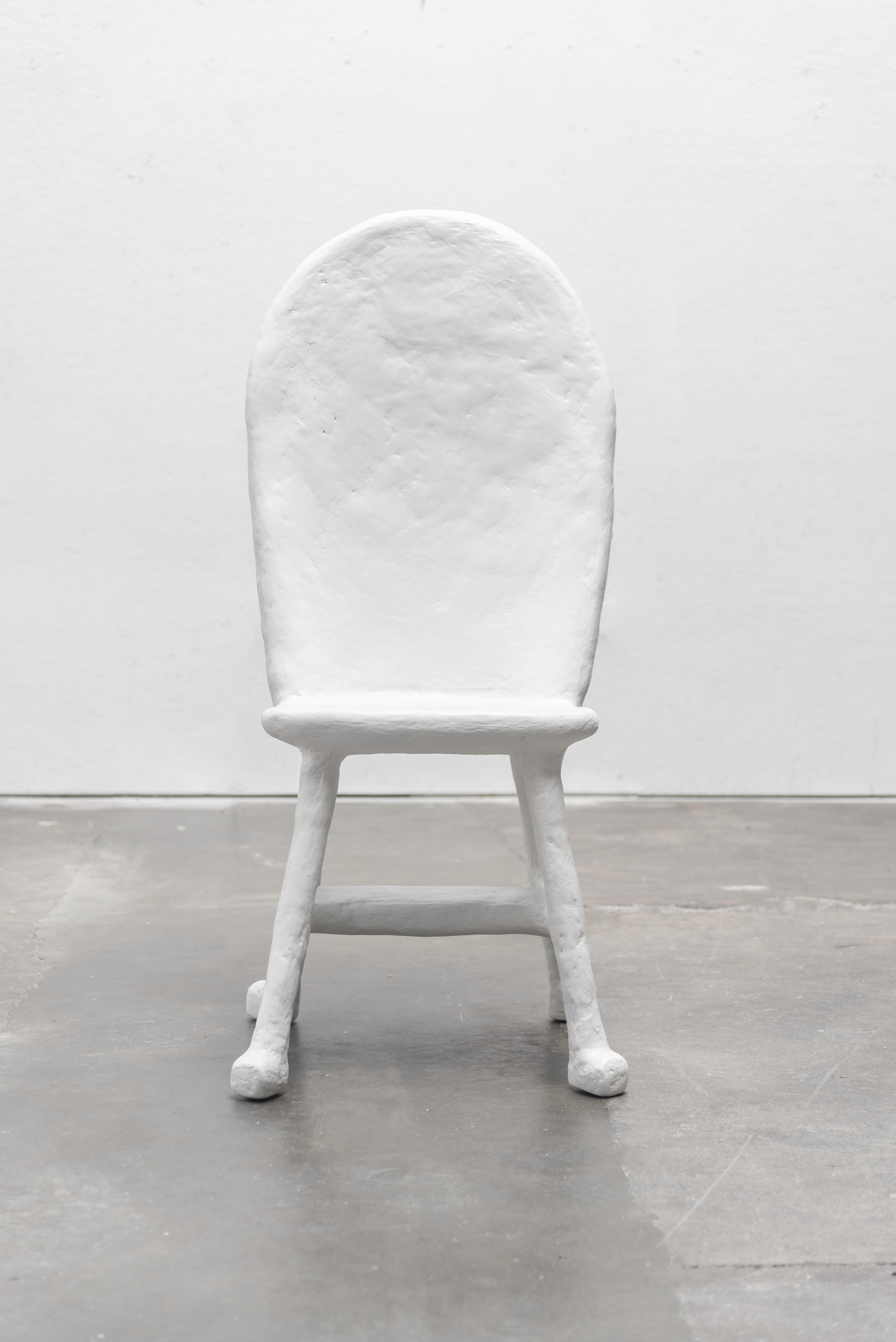 The Caquetoire Dining Chair by Brent Warr offers a refined, modern take on the historic 16th-century French conversation chair. A pared-down counterpart to the Lord Chair, this version features a singular sculptural sphere at the back—an understated