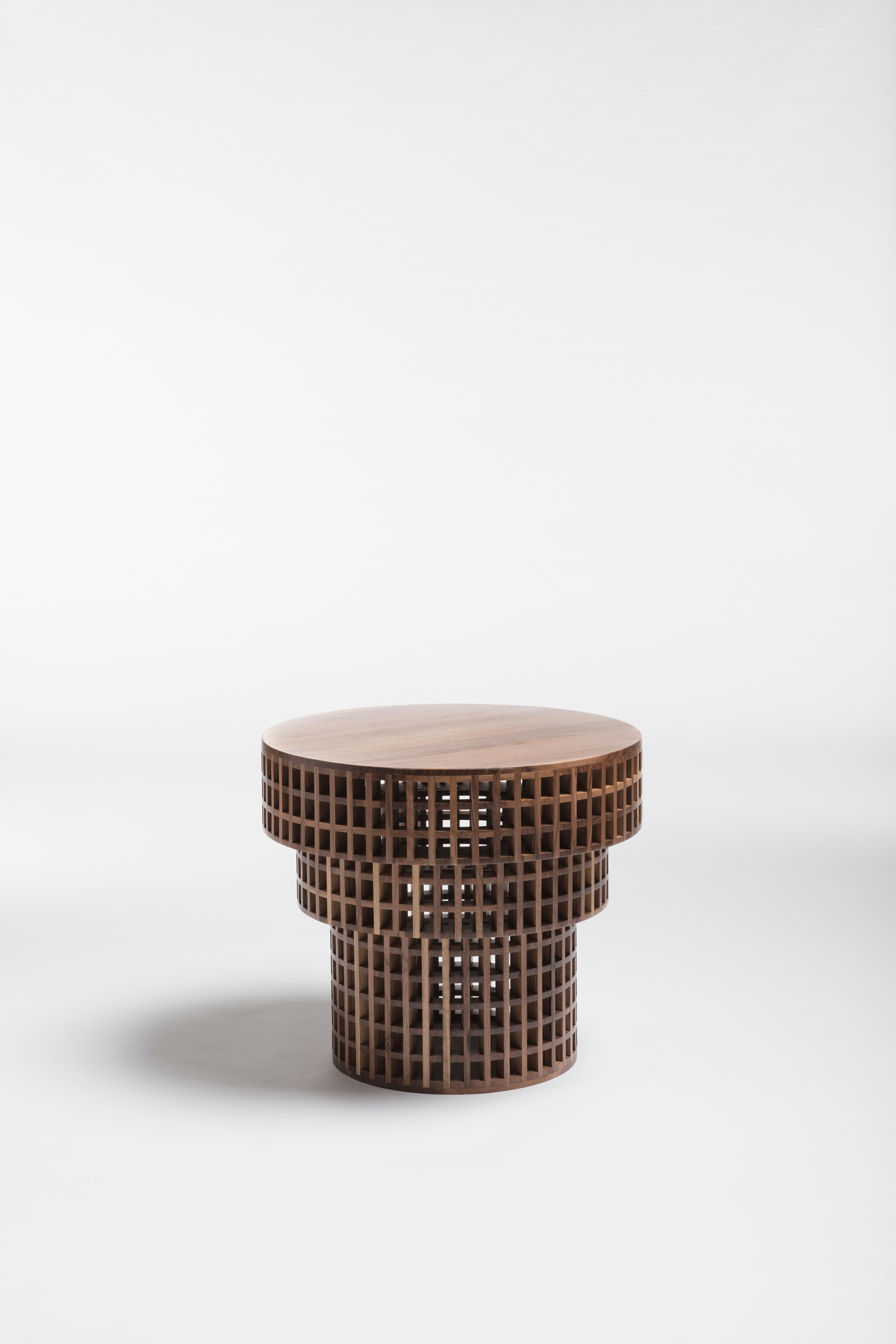 Carabottino tavolino side table by Cara Davide
Carabottino collection
Medulum
Dimensions: Ø 58 x H 51 cm
Materials: Canaletto walnut 

Also available: linden wood, European walnut

A wooden grating in a two-dimensional form traditionally