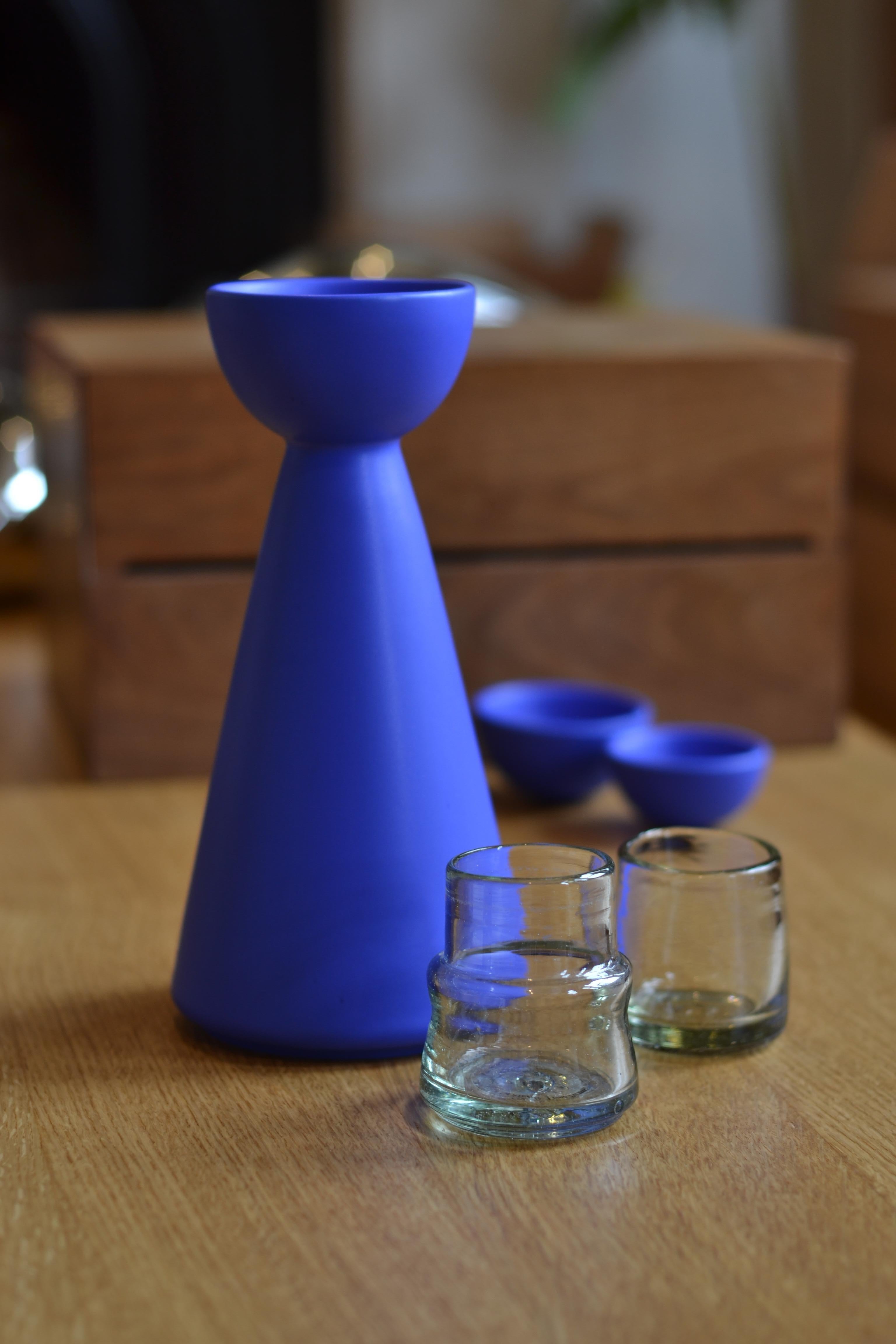 Glazed Mezcal and Tequila Bottle and two cups. Ceramic Blue and white Tequila bottle. For Sale