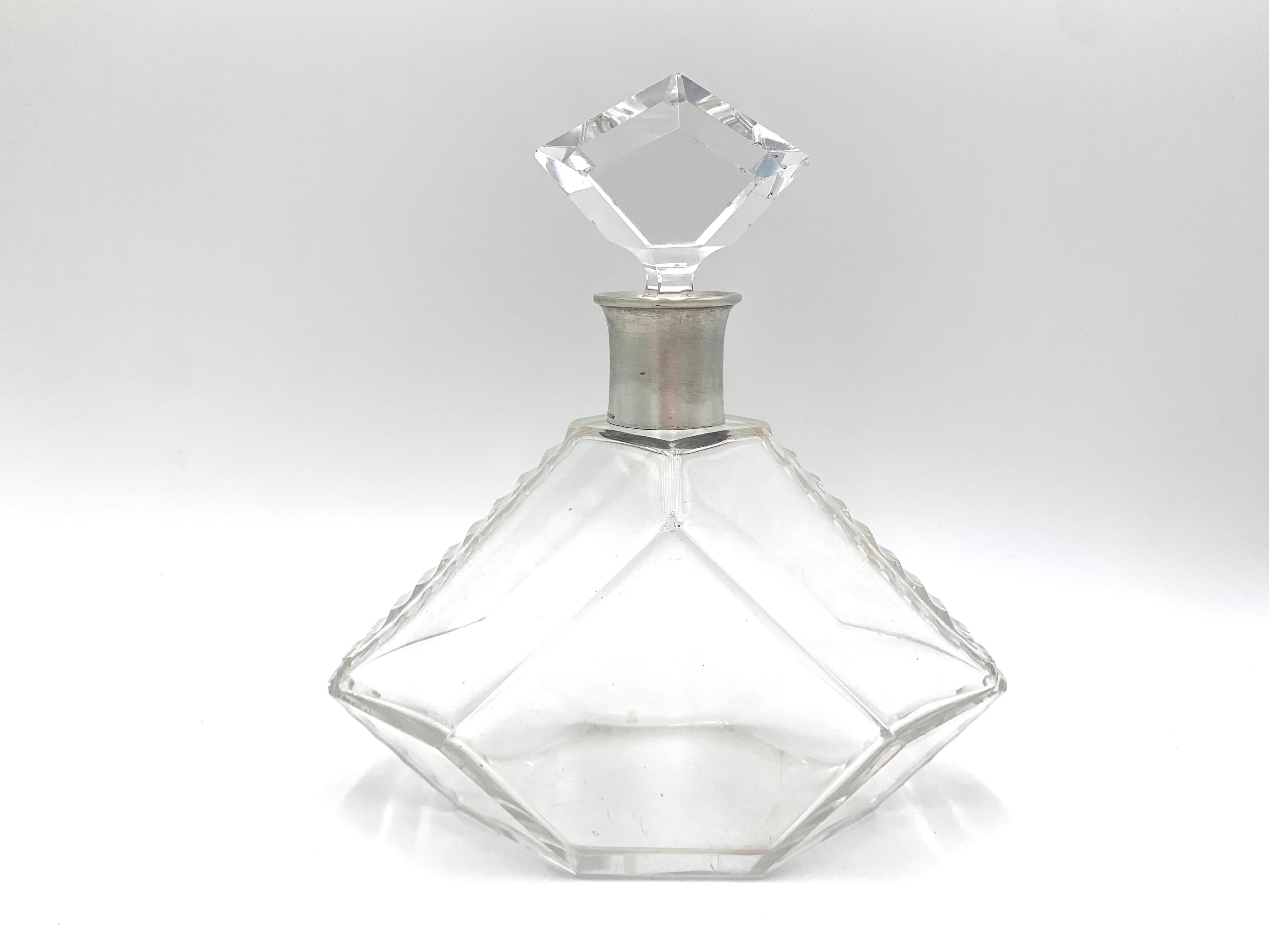 A crystal decanter with an 800 silver neck from the exquisite Julius Lemor silverware factory in Breslau.
The company operated in the years 1818-1945 and was run by four generations of the Lemor family.
The prestigious factory has been awarded