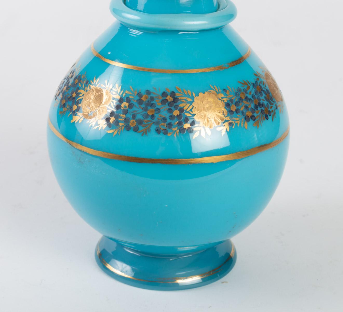 Carafe in turquoise blue opaline, gilded and enameled, Charles X period, 1830-1840

Measures: H 27 cm, D 14 cm.