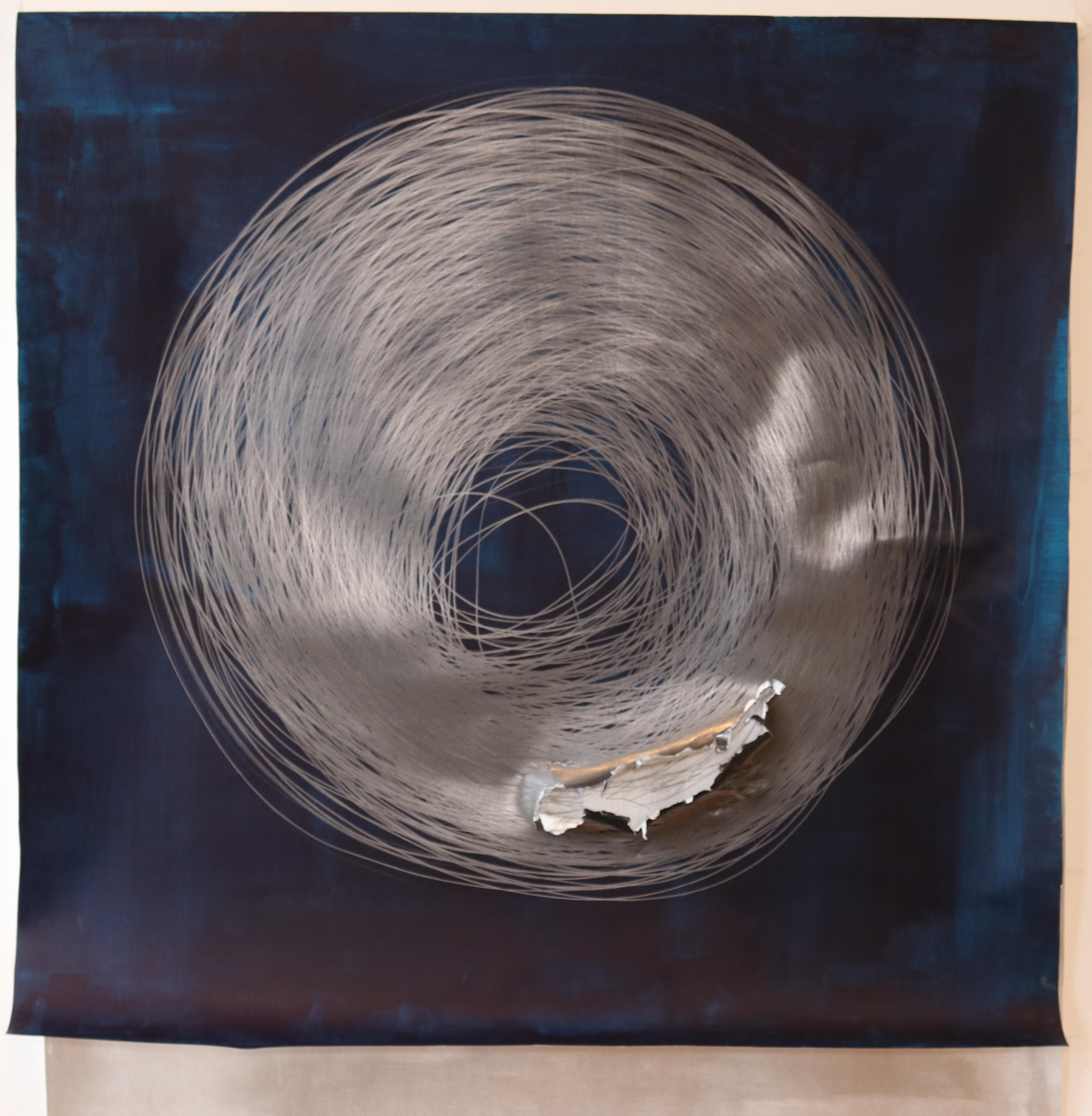 'Work no. 1 (Circle Drawing), Silver / Blue, 2018’ graphite and silver leaf on 315 gsm Heritage Fine Art Paper by Carali McCall (born 1981).  

McCall began her ‘Circle Drawing' artworks in 2004 where she focuses on the durational element and