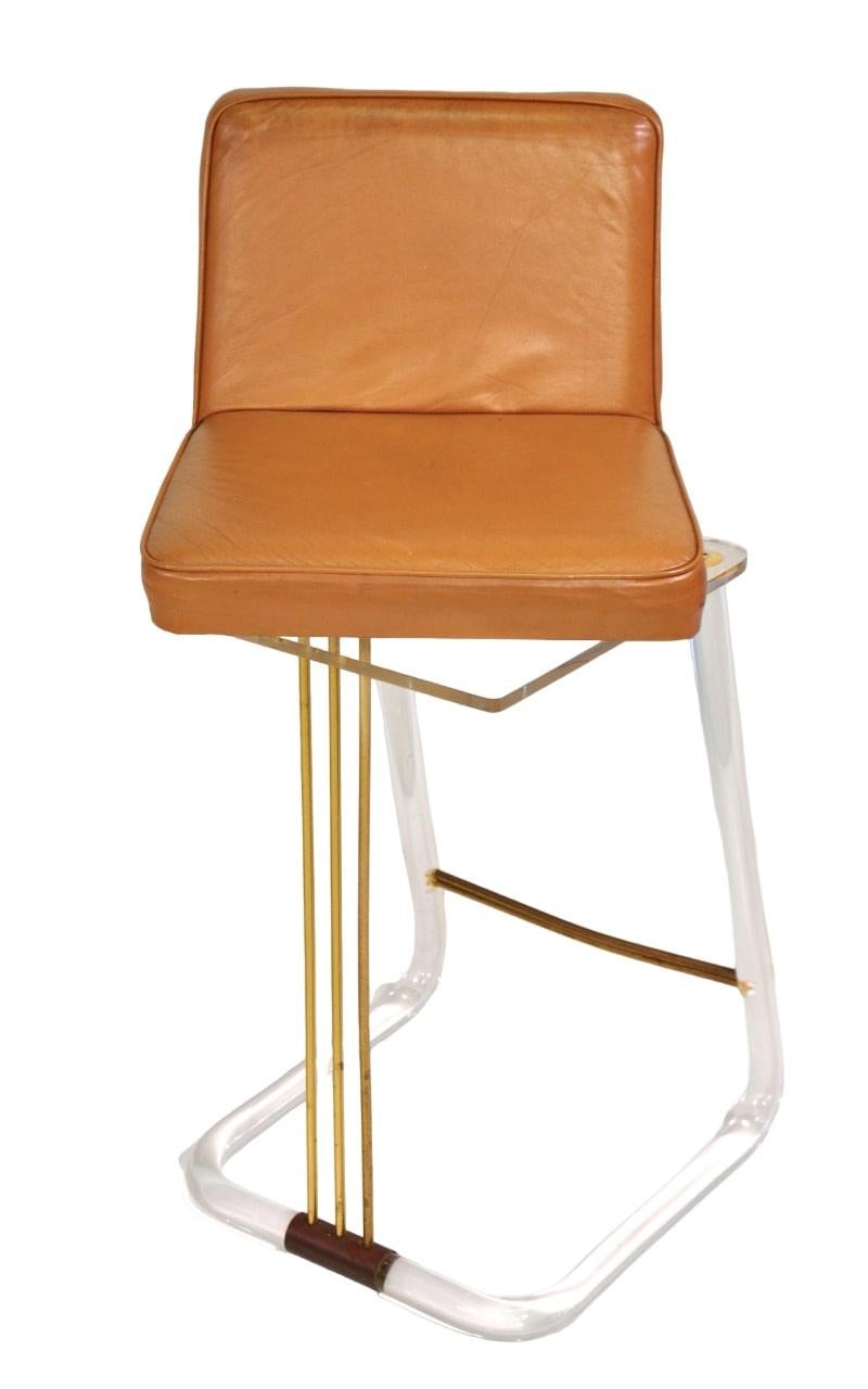 Caramel Leather and Lucite Swivel Bar Stools by Lion in Frost 1