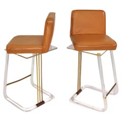 Caramel Leather and Lucite Swivel Bar Stools by Lion in Frost