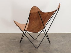 Chaise papillon Knoll en cuir caramel