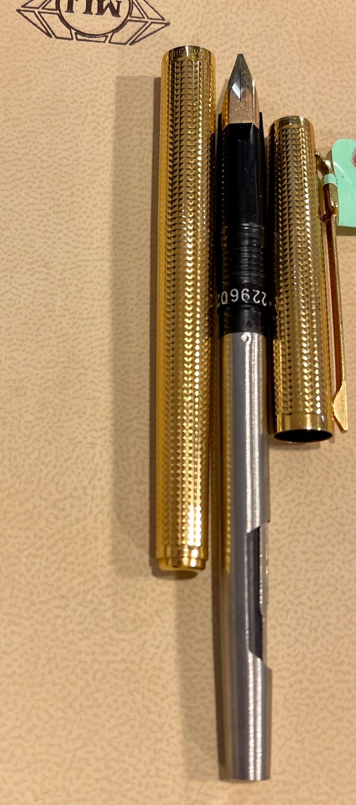 100 % authentic and Vintage 
Brand: Caran d'Ache
Stamped : Caran d'Ache , Swiss , Gold Plated G , 229602
Caran d'Ache is one of the world's most renowned pen makers, creating writing tools with sensational style and unique characteristics. This