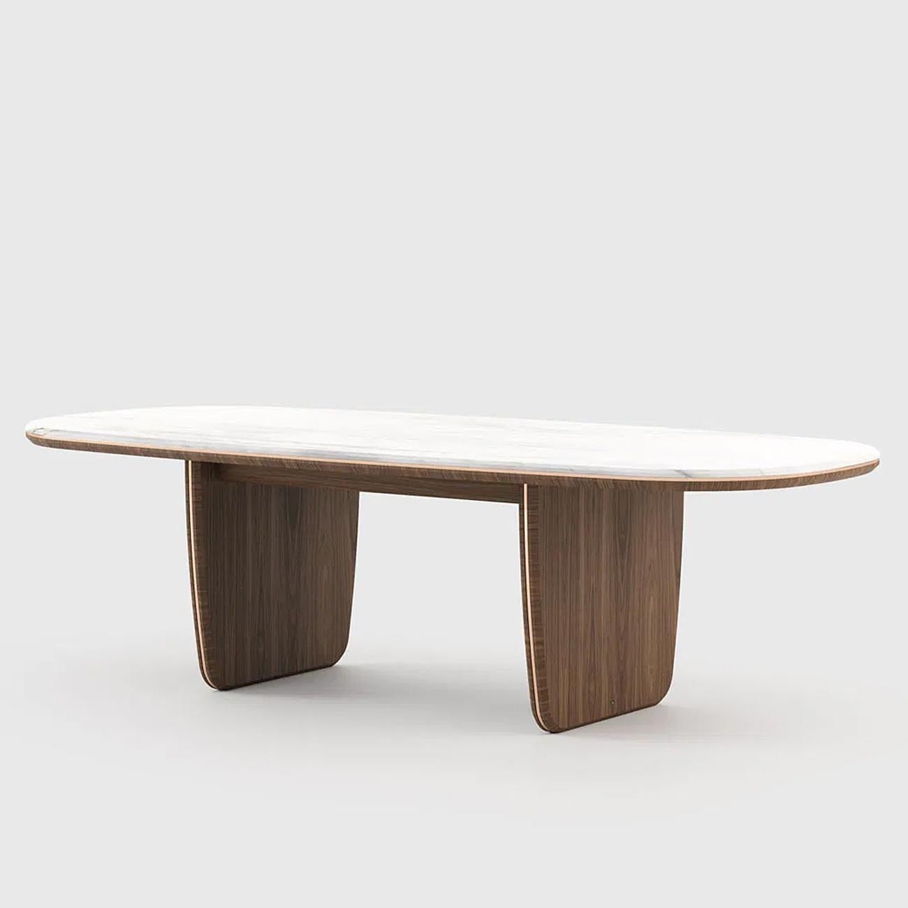 Dining table Carara with structure in matte walnut wood
and with top in walnut wood and Estremoz white marble.
With polished stainless steel trim in gold finish on feet.
Also available in other wooden finishes on request:
in black ash matte, or in