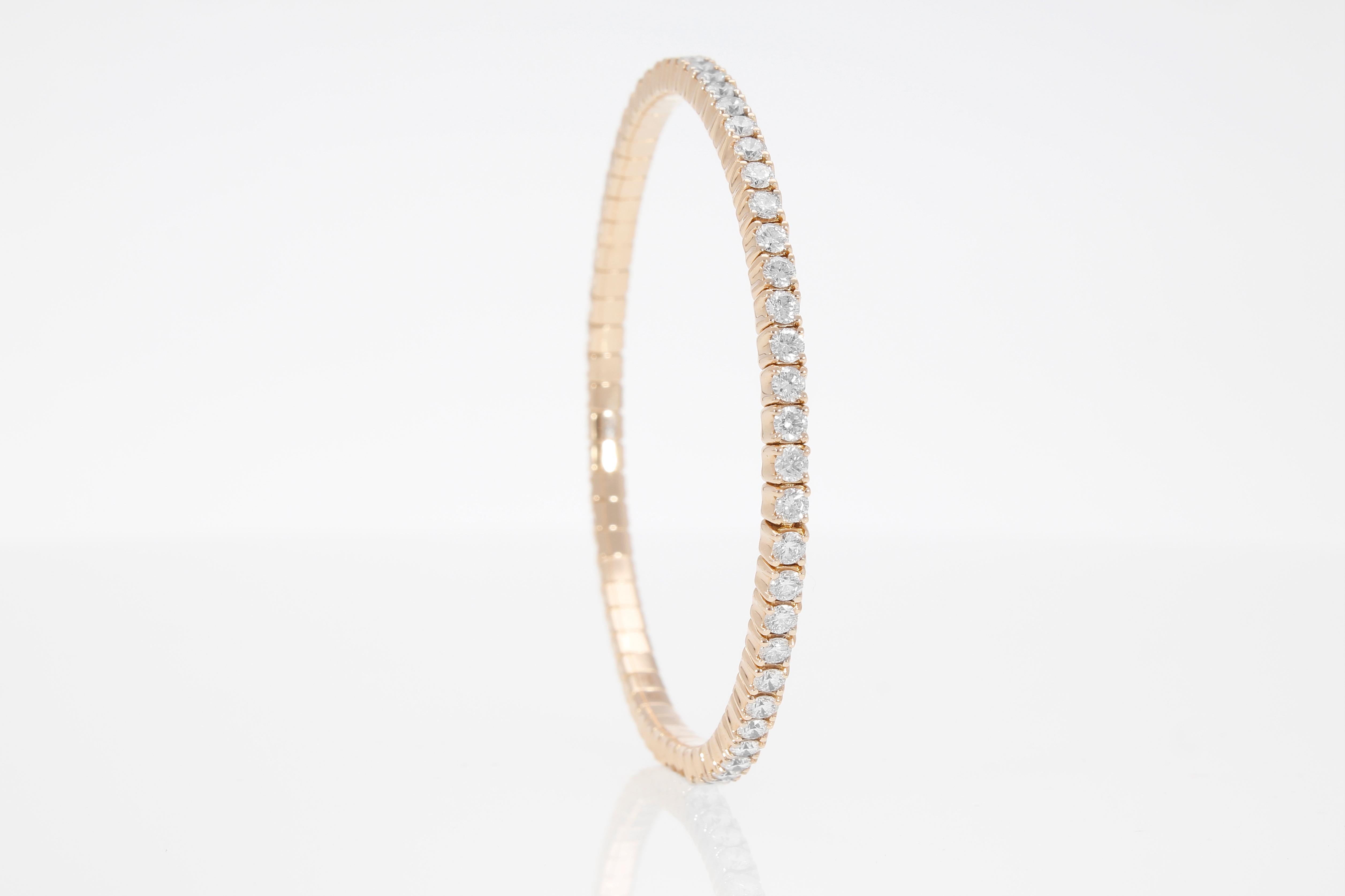 Elastic tennis bracelet with 64 diamonds for a total weight of ct 4.11.
The bracelet has no closure as it is elastic.
The bracelet is in 18 Kt rose gold. 
Total weight: 14.3 grams
Total carat: ct 4.11
Number of diamonds: 64
The bracelet is