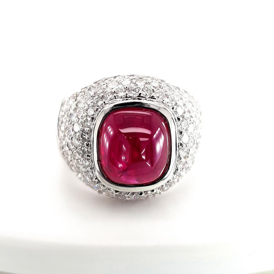 18kt White Gold Ring 4.05ct Burma Ruby, 5.76ct Diamonds,  CGL Certified

Elegant big ring full of diamonds and a ruby in the centre.

Diamonds: Approx 5.76 carat.

RUBY'S: 4.05 carat in total, Burma Myanmar, red, sugar loaf, ruby, Variety of