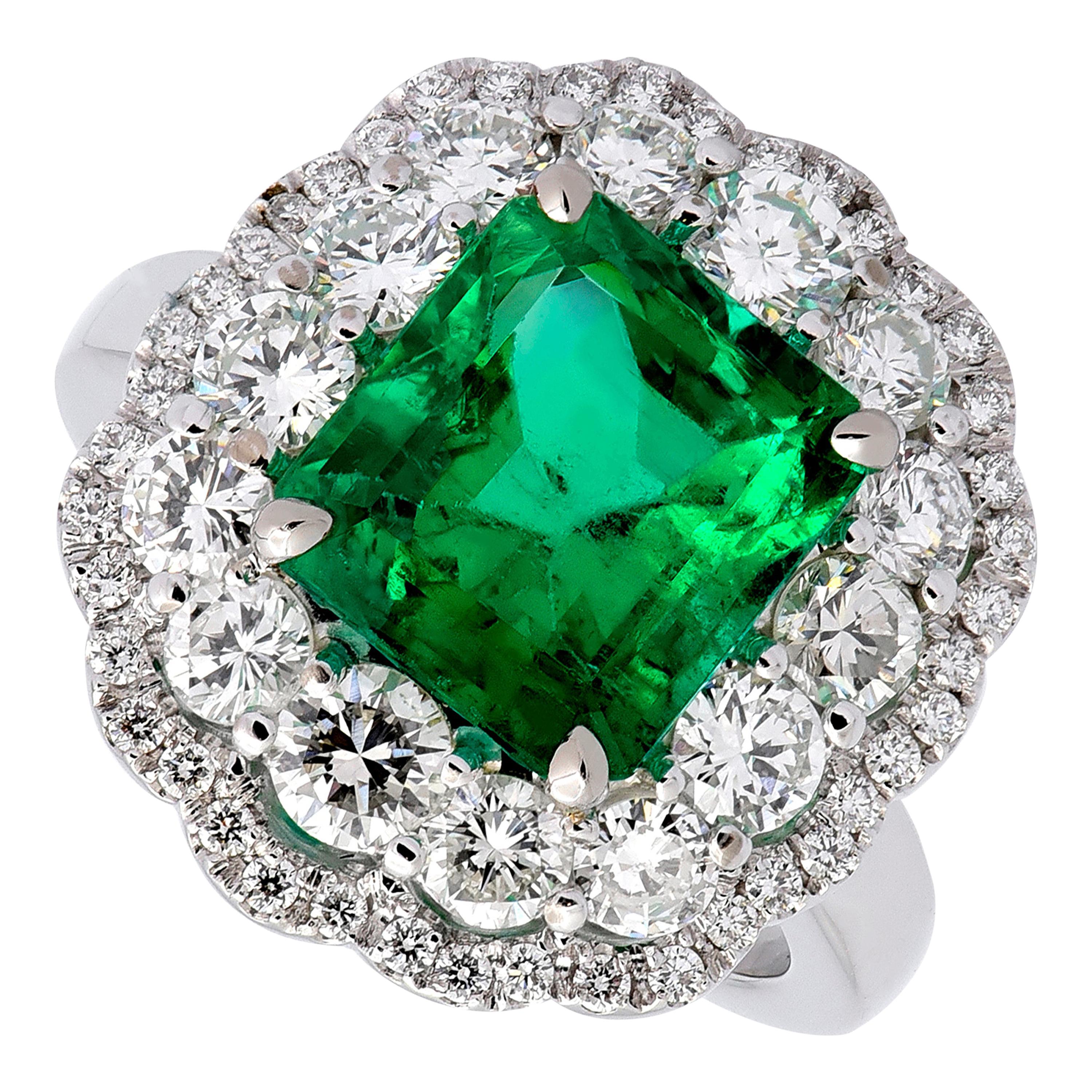 Incredible ring set with a emerald stone of 4.43 carat and diamonds.

One of a kind handcrafted solid 18 karat white gold ring with amazing Colombian Emerald.

Emerald is very difficult to photograph and actual Emerald is much nicer then on