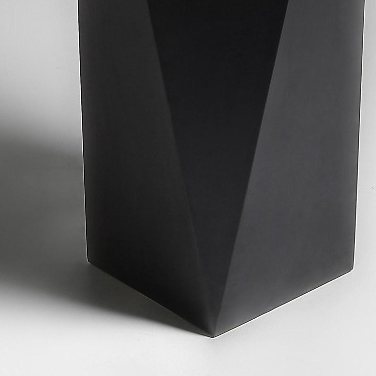 The large pedestal from the Carat line showing hand aged steel facets.
By Georges Amatoury Studio, 2014.