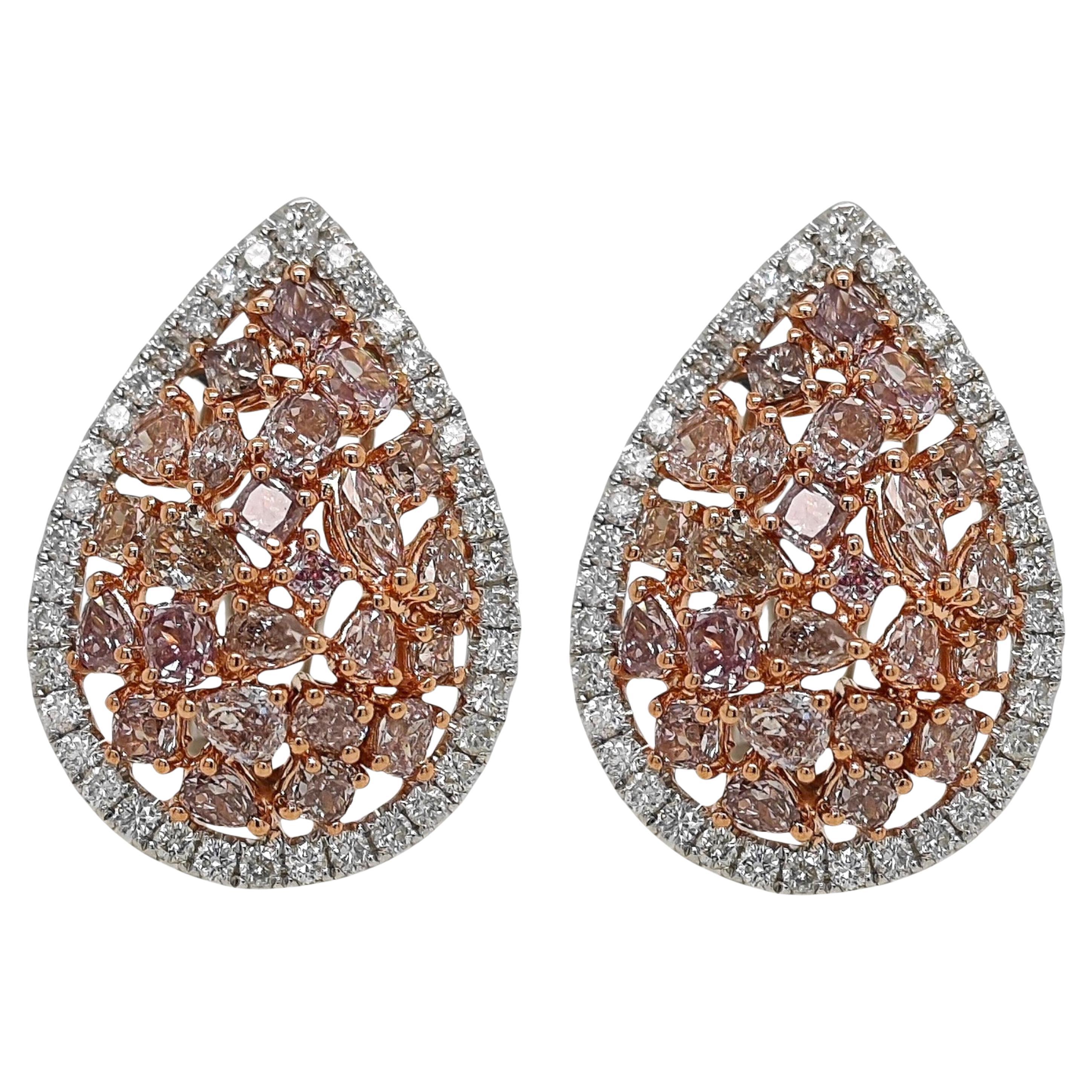 Orecchini in oro bianco con diamanti rosa e bianchi da un carato