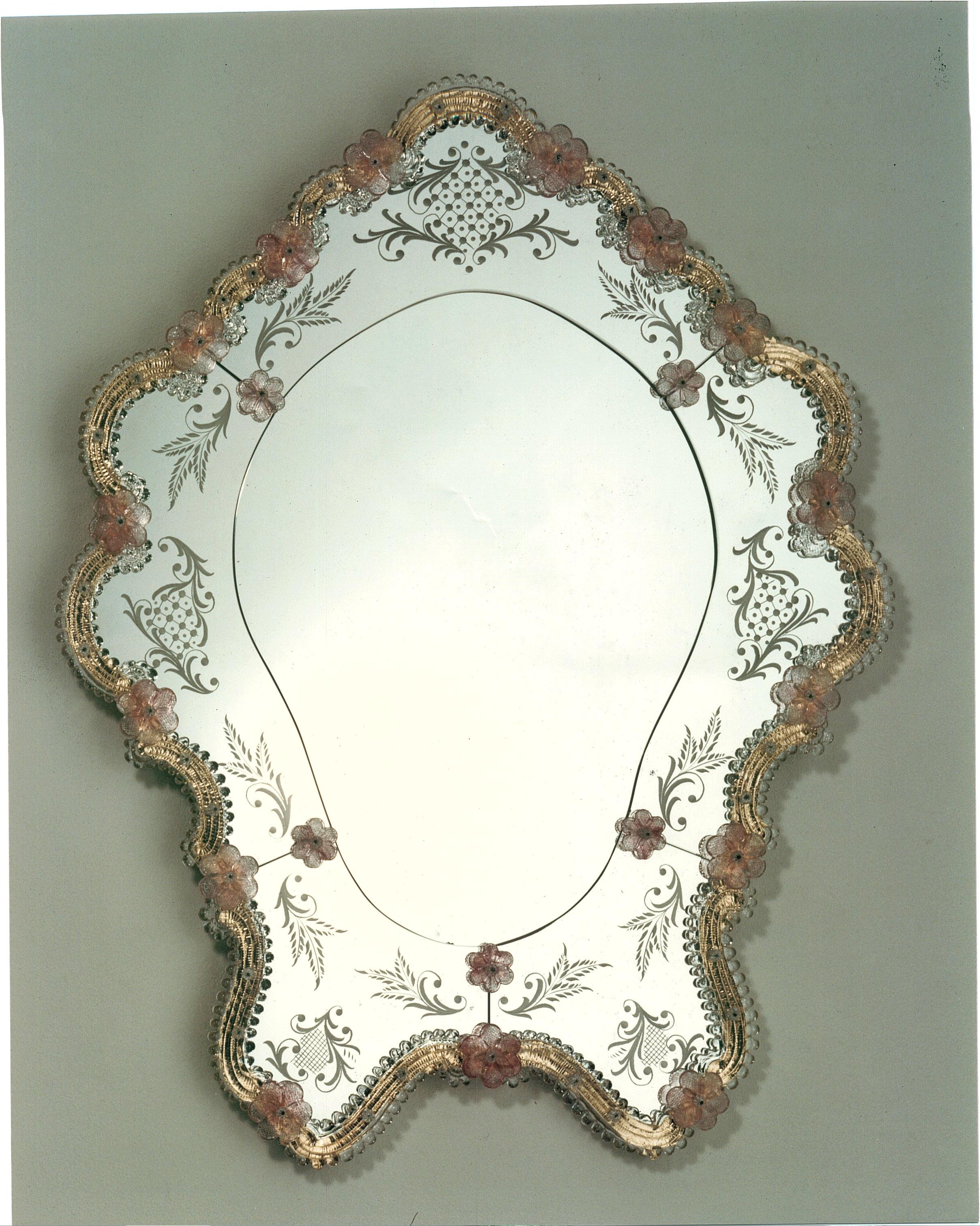 Murano glass mirror in Venetian style, mirror made from a design by Fratelli Tosi, entirely handmade according to the techniques of our ancestors. Mirror composed of a crystal and ruby frame in Murano glass and decorated with Murano glass curls, all