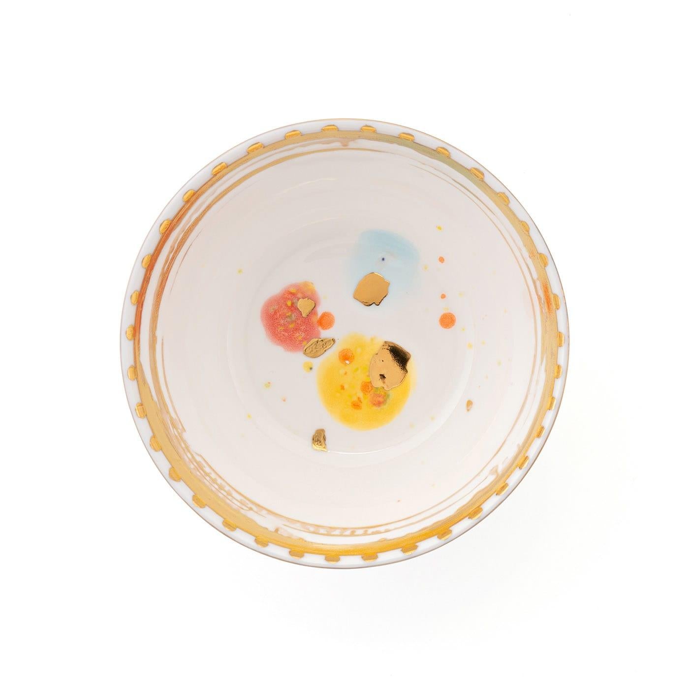 Recalling the splendor of Baroque art embodied by Caravaggio, this superb set of two porcelain fruit bowls is minutely crafted and decorated by hand. The combination of red, yellow, and light blue spots creates a lively decoration ennobled by the