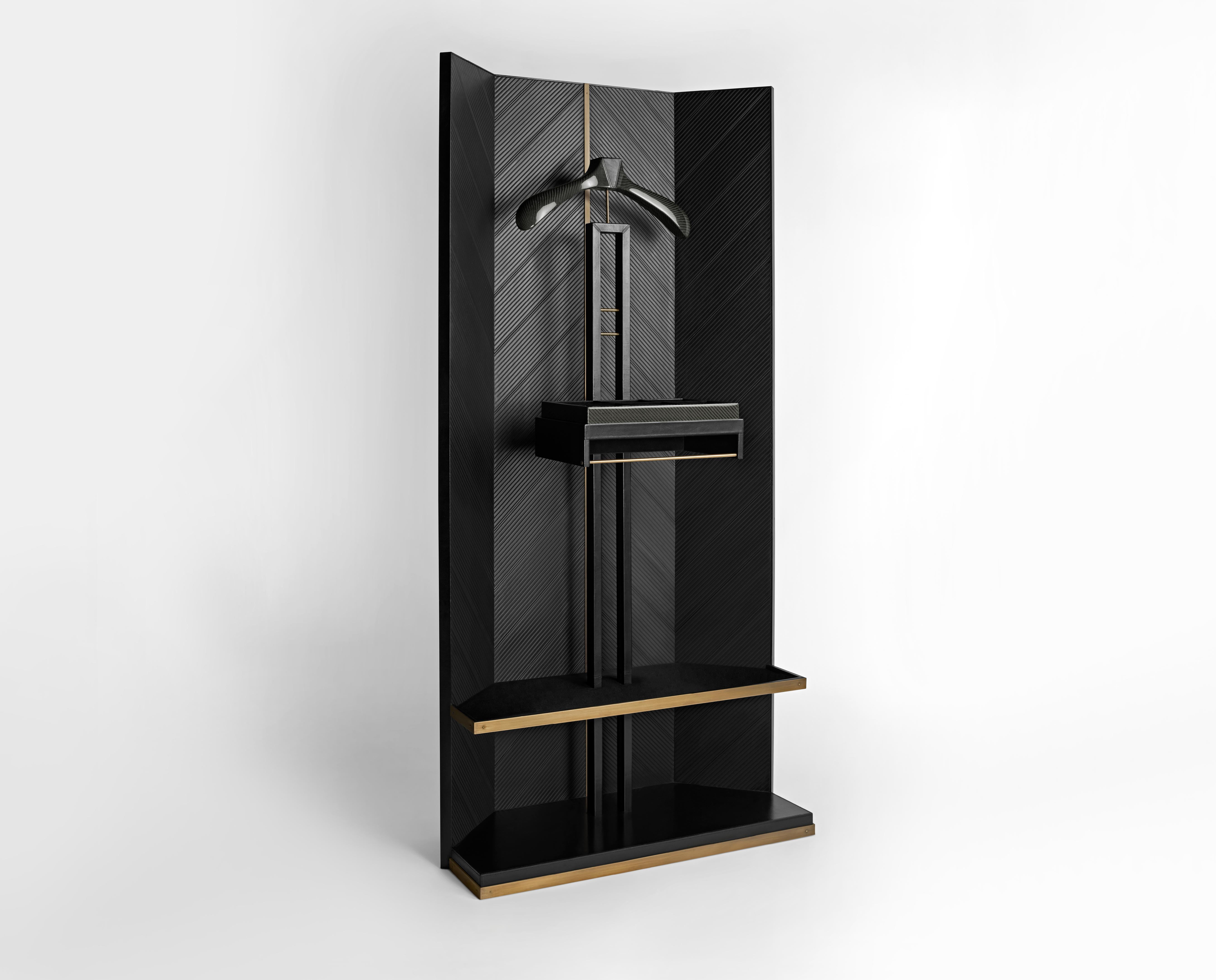 Carbon Fiber Rialto dressing valet by Madheke
Dimensions: W 89.8 x D 43.7 x H 183.2 cm
Materials: Carbon fibre, leather, fabric, metal 

The elegant freestanding valet is a vintage revival reimagined into a contemporary design to suit the modern