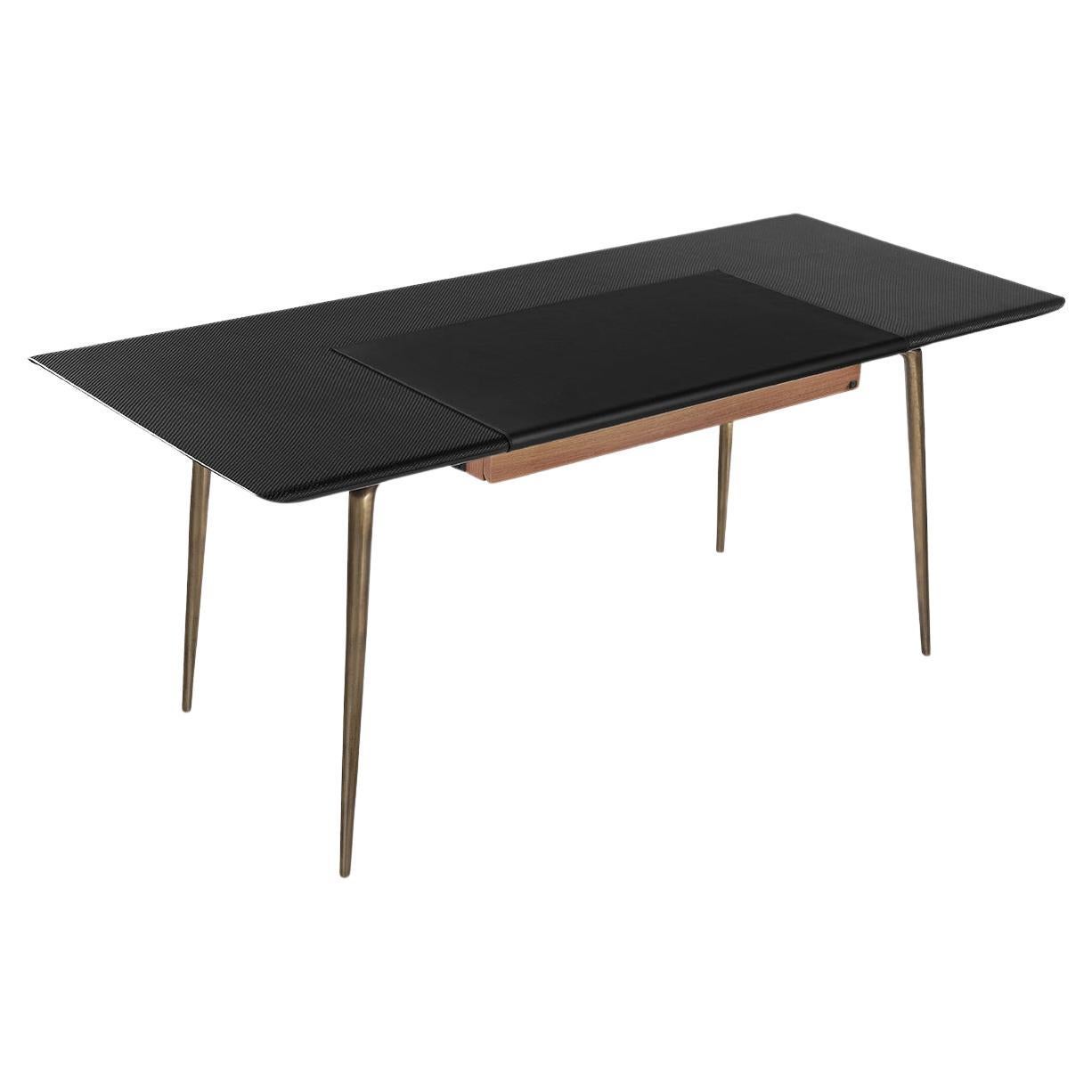 Designed to create a statement, the Talon desk is a synthesis of traditional craft and high-performance materials. Carbon fibre is countered by textured sand-cast brass, the oldest of casting processes tracing back to the Bronze Age.

Talon’s