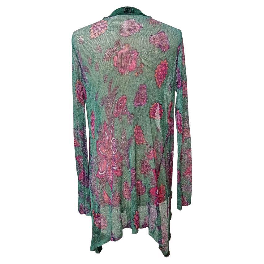 Rayon Multicolor fancy on green base Long sleeves Crystals application on the edge Length shoulder/hem cm 76 (2992 inches) Shoulders cm 34 (1338 inches)
