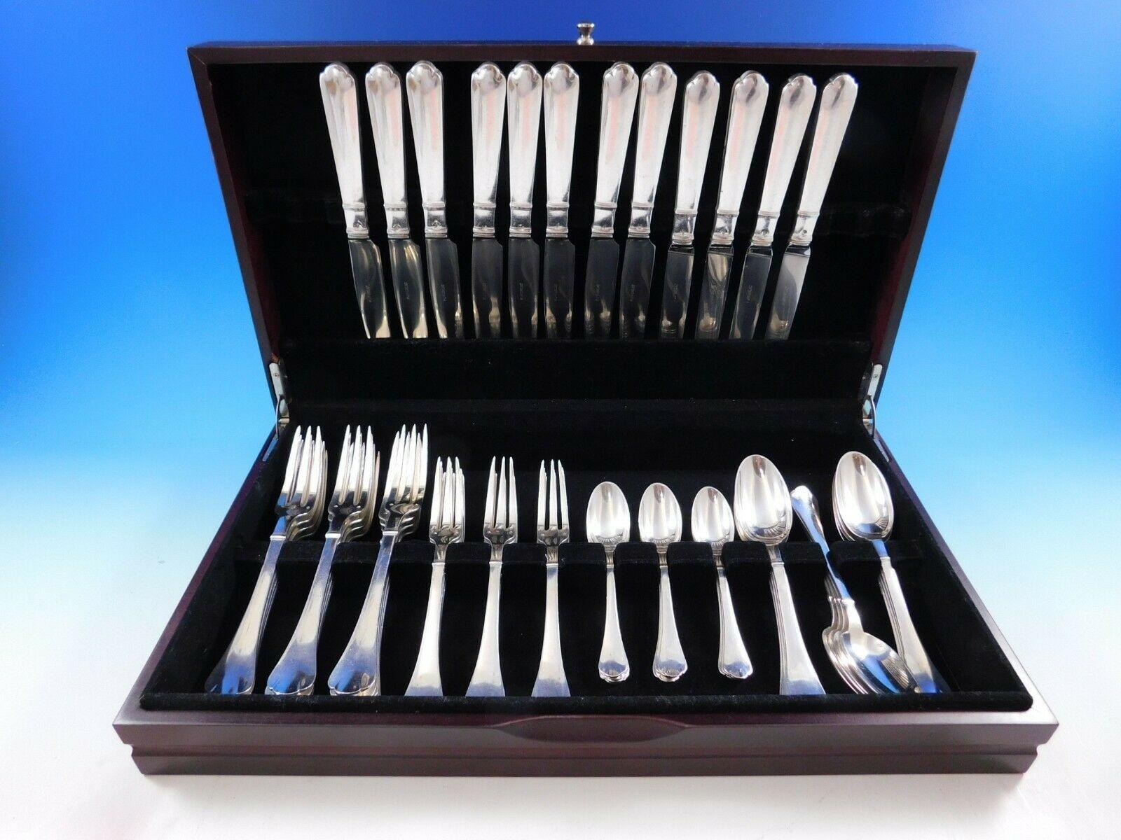 Outstanding Cardinal by Puiforcat French sterling silver flatware set, 59 pieces. This set includes:

12 dinner knives, 8 with french blades - 10