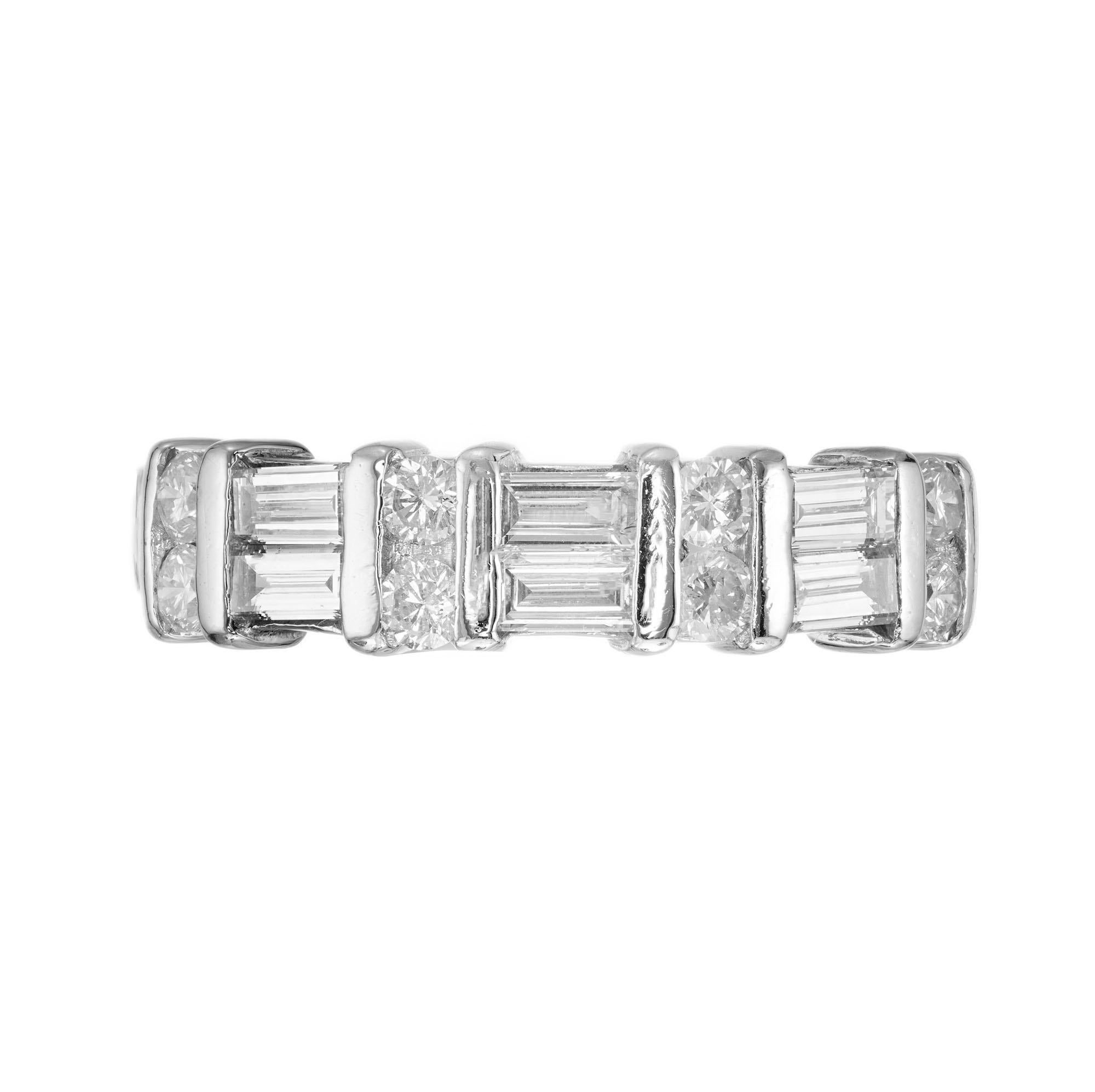Two row platinum round and baguette diamond wedding band from Cardow

8 round brilliant cut diamond G VS-SI, Approx. .24cts
6 straight baguette diamonds G VS, Approx. .60cts
Size 6.5 and sizable +/- one size
Platinum 
Stamped: PT900
Hallmark: