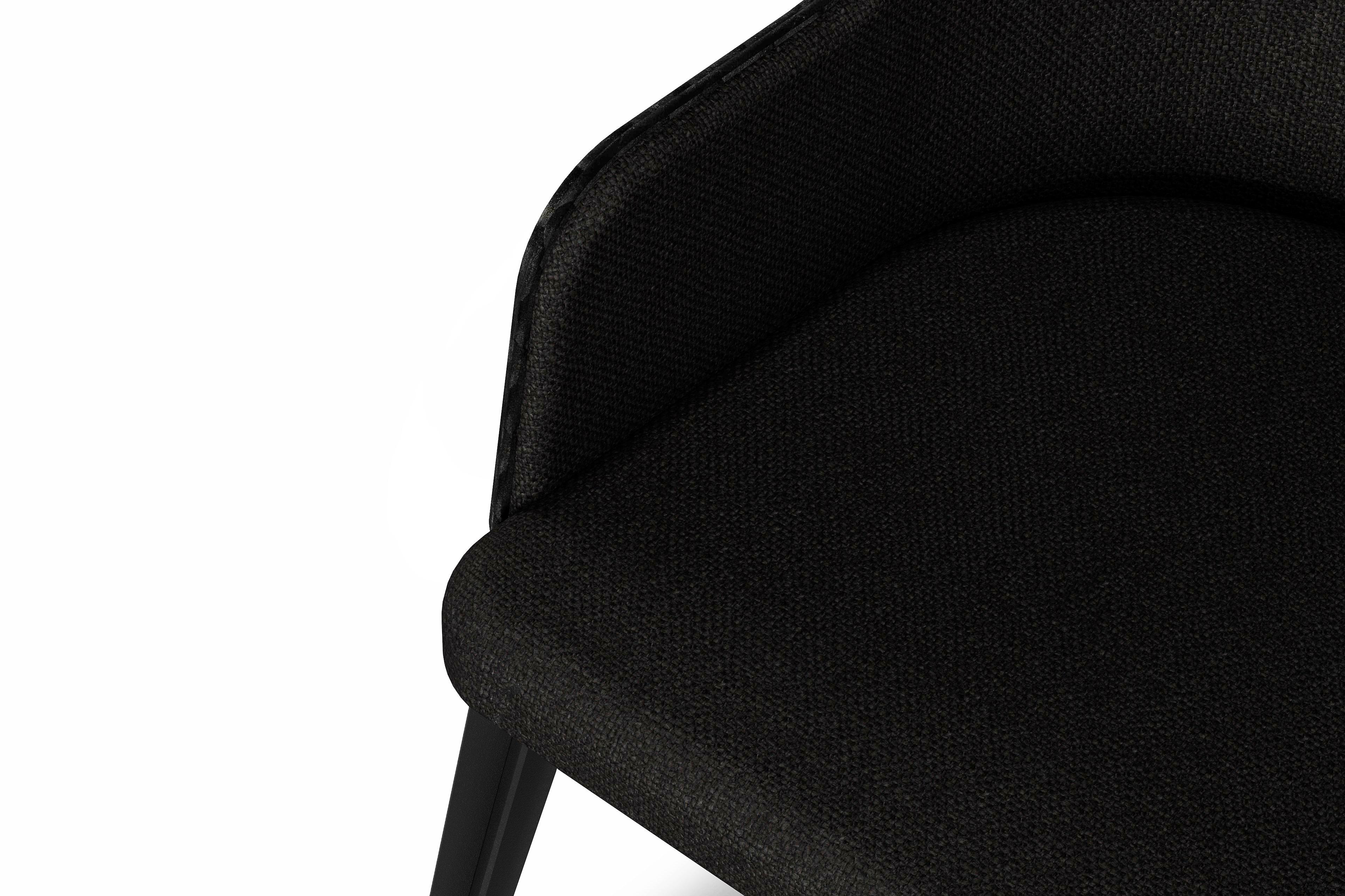 Steel Care upholstered armchair with black steel legs For Sale