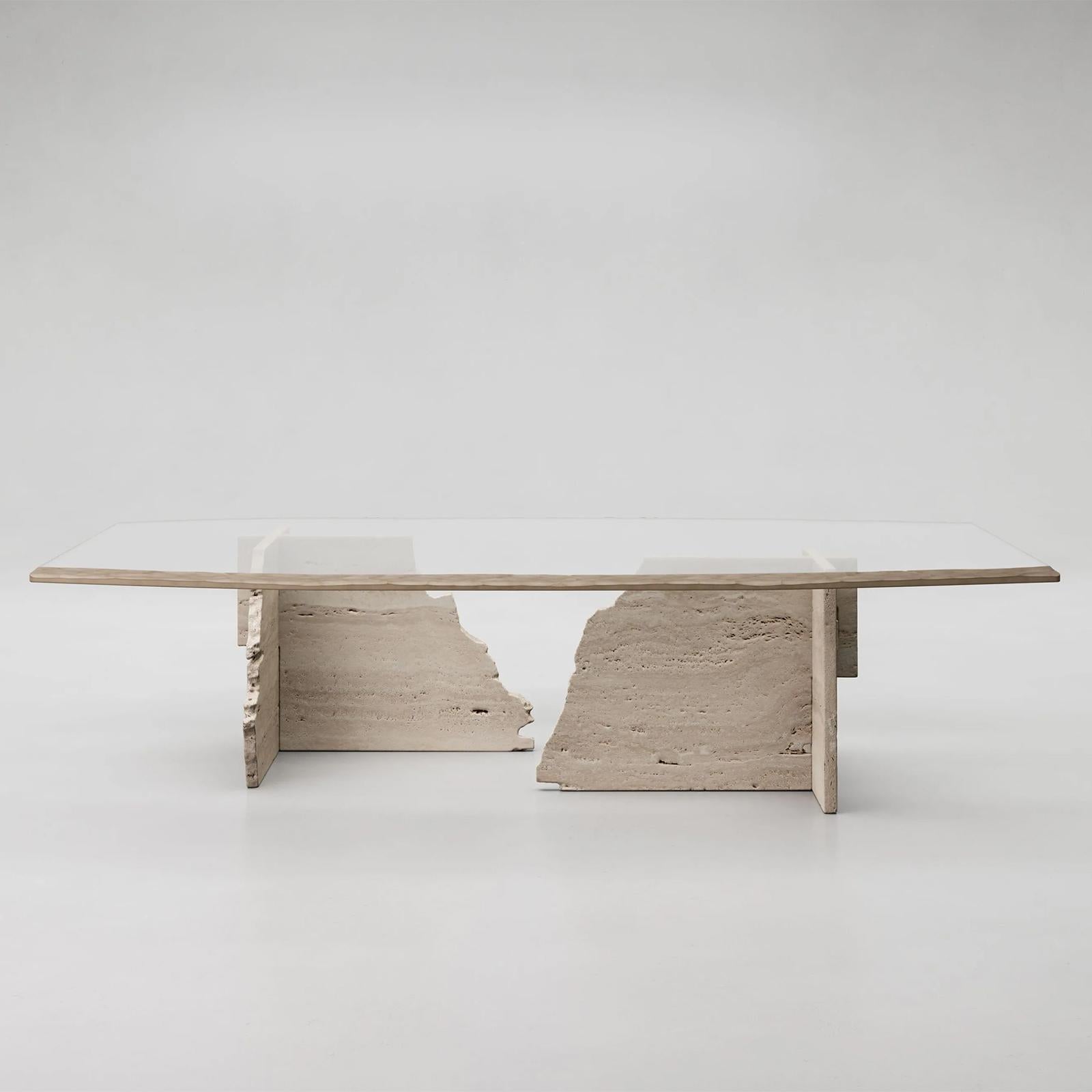 Coffee Table Careletto Travertine with clear glass top
with crackeled bronzed pattern each side and with
travertine base with 1 irregular edge on each part of
the base.