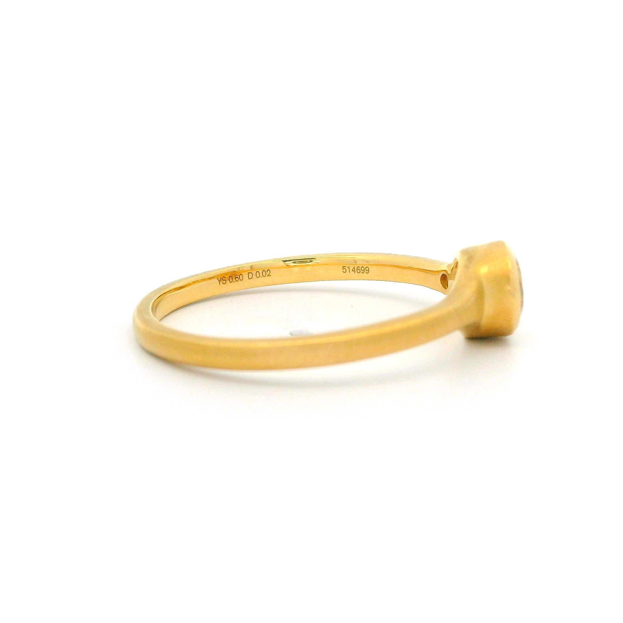 Carelle, bague en or jaune 18 carats avec diamants et saphir jaune à lunette de 0,62 carat Pour femmes en vente