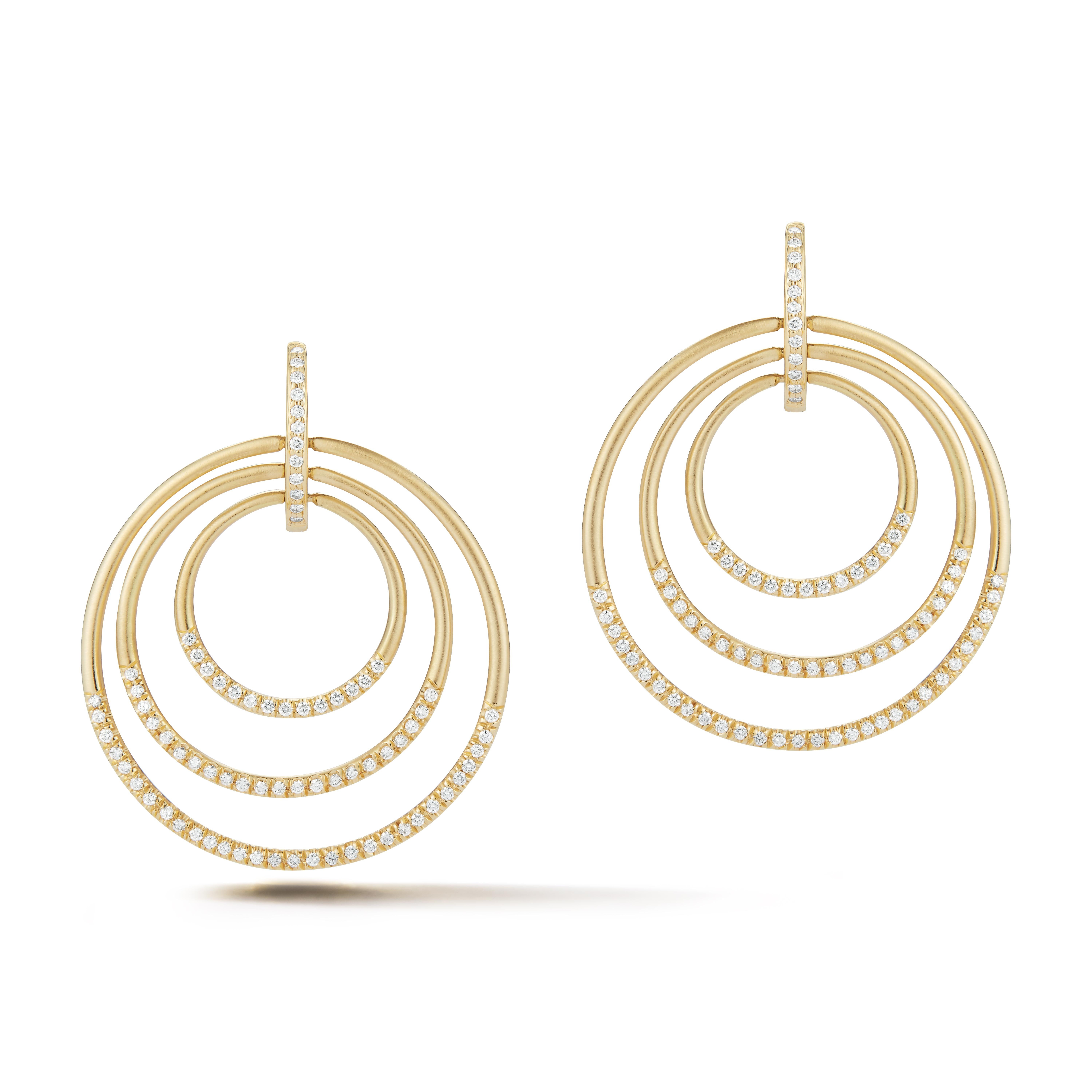 Drawing inspiration from the 1930's Streamline Moderne movement, sleek curves and horizontal lines sculpt architectural adornments of structure and sophistication.

The definition of minimalist chic, these large Moderne earrings captivate with three