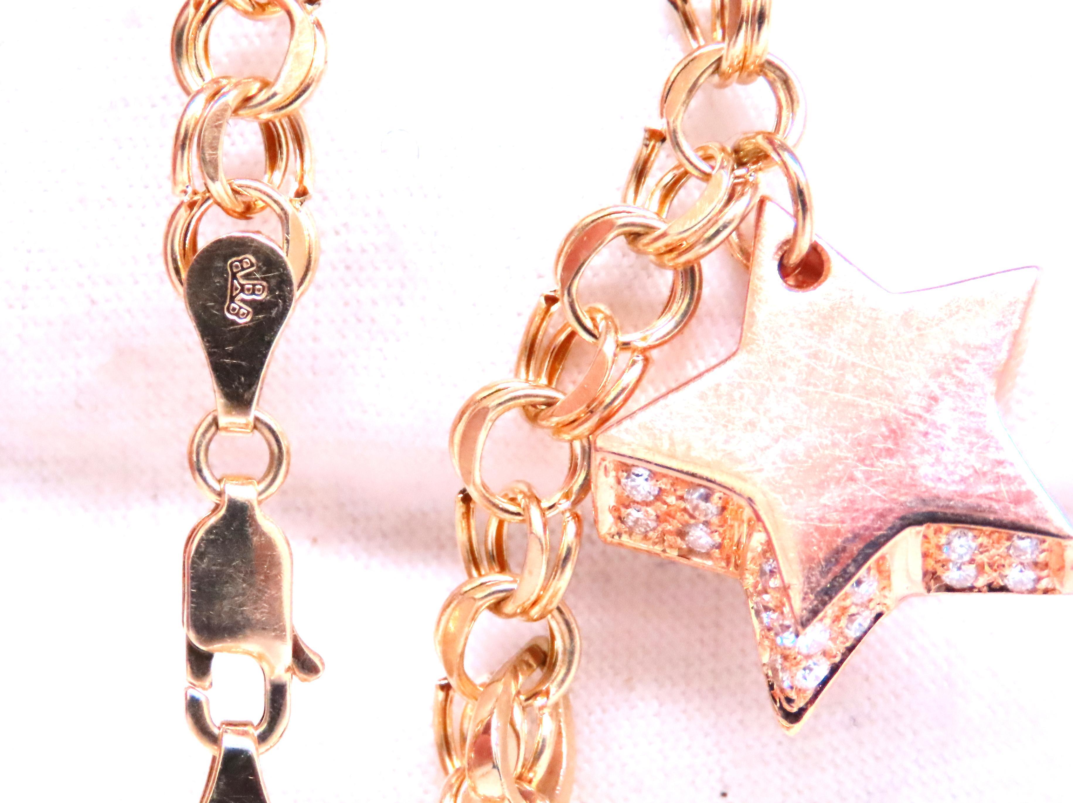 Natürliche Diamanten charms Armband 
6 charms:
Herz: 14 x 14 mm
Kreuz: 21 x 14 mm
Stern: 17 x 17 mm
Flops: 19 x 19 mm
Wunschknochen: 17 x 13 mm
Süßwasserperle: 19 x 8 mm 
Breite der Kette: 5,5 mm
.60 Karat natürliche Diamanten im Rundschliff
h Farbe