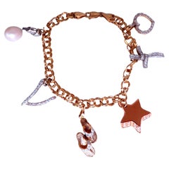 Caribbean keepsake natural diamonds charm bracelet 14Kt gold 12457*